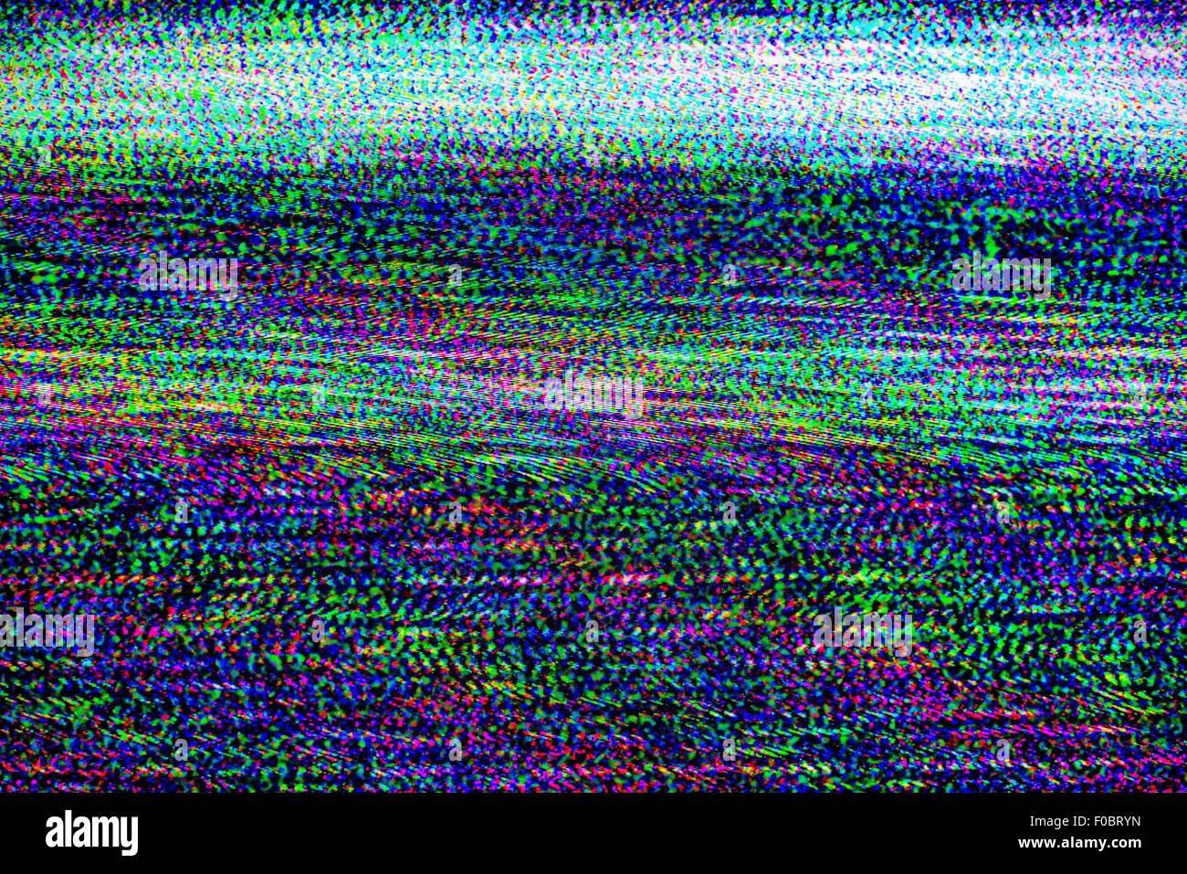 TV damage, bad sync TV channel, RGB LCD television screen with static noise from poor broadcast signal reception Stock Photo