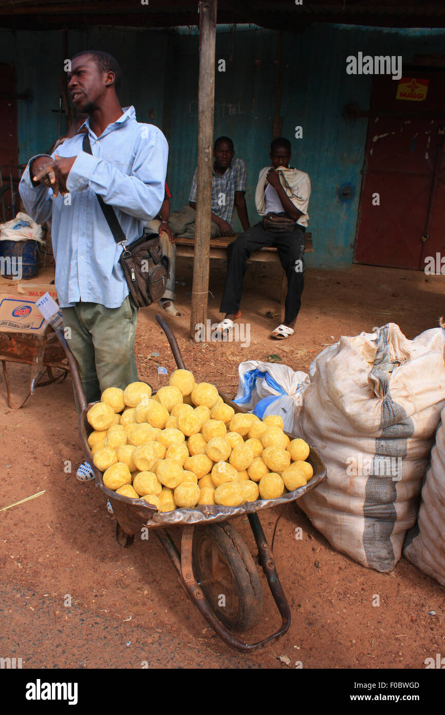 BAMAKO, MALI - SEPTEMBER 27, 2008: man trading soap at the market in Bamako, Mali, september 27, 2008 Stock Photo