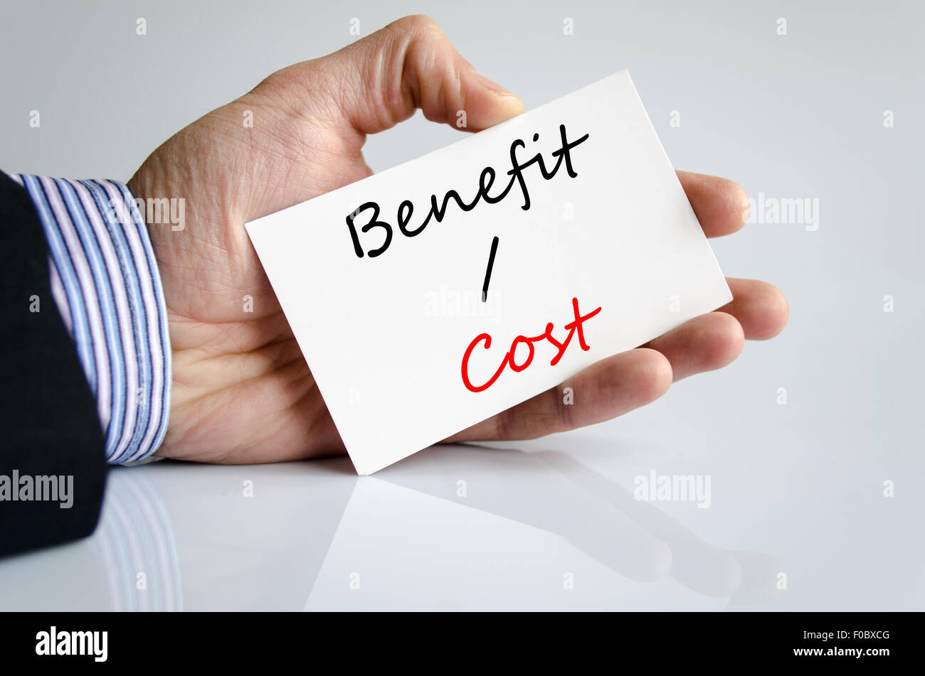 Benefits cost text concept isolated over white background Stock Photo