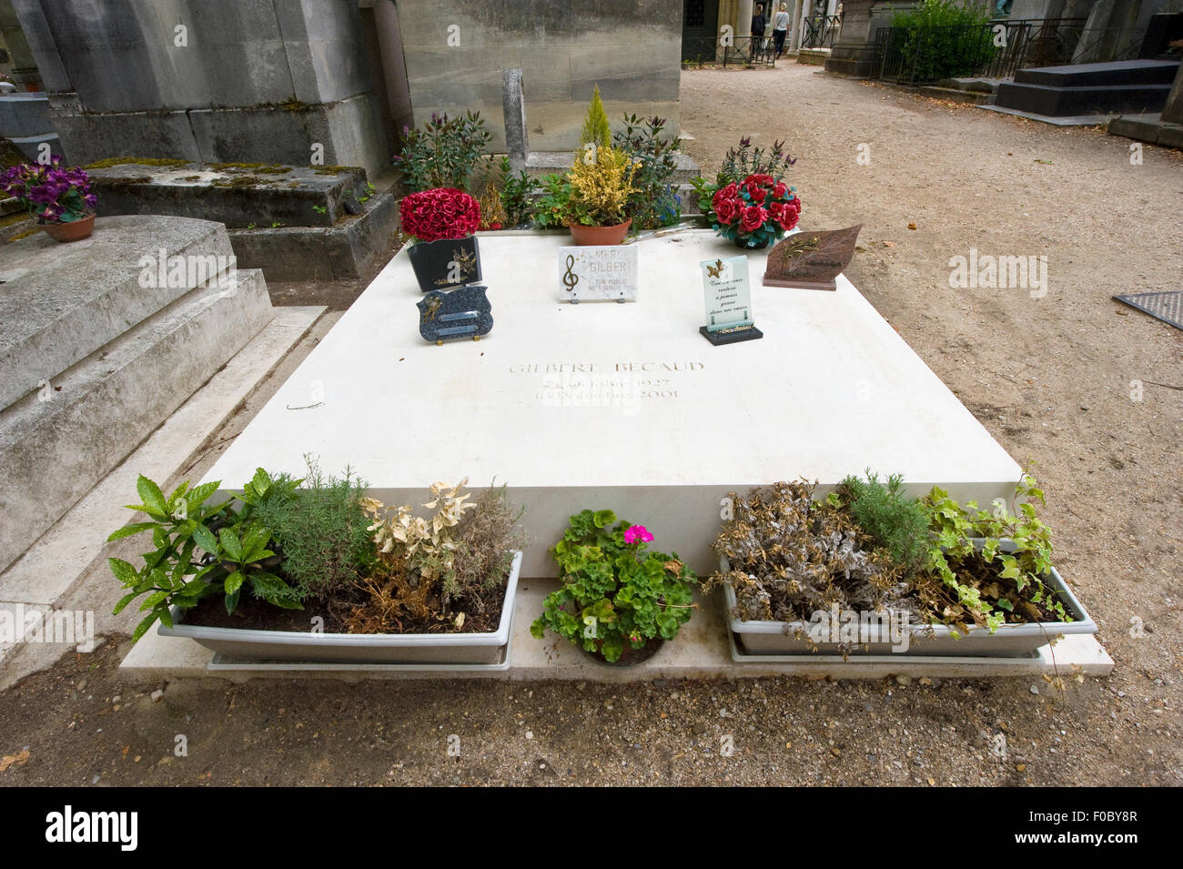 Grave of singer and star Gilbert Becaud on cemetery Pere Lachaise in Paris in France. Stock Photo