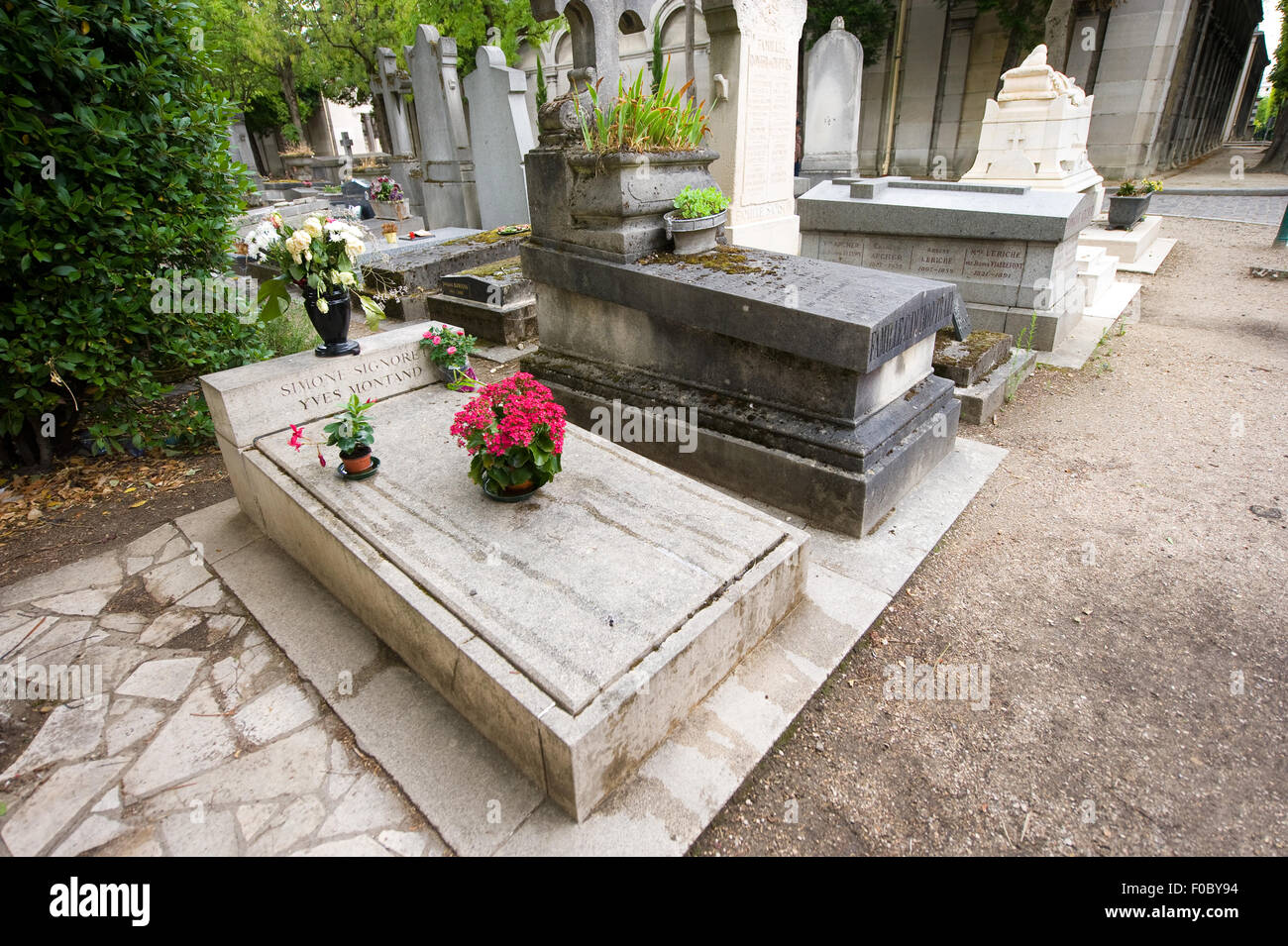 Grave of actor's couple Simone Signoret and Yves Montand on cemetery Pere Lachaise in Paris in France Stock Photo