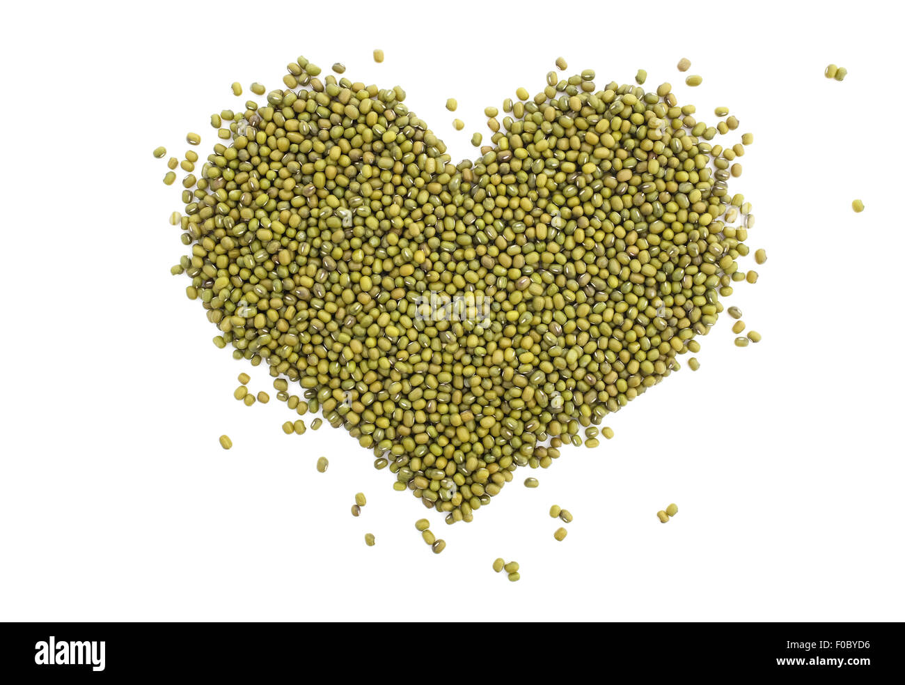 Mung beans in a heart shape, isolated on a white background Stock Photo
