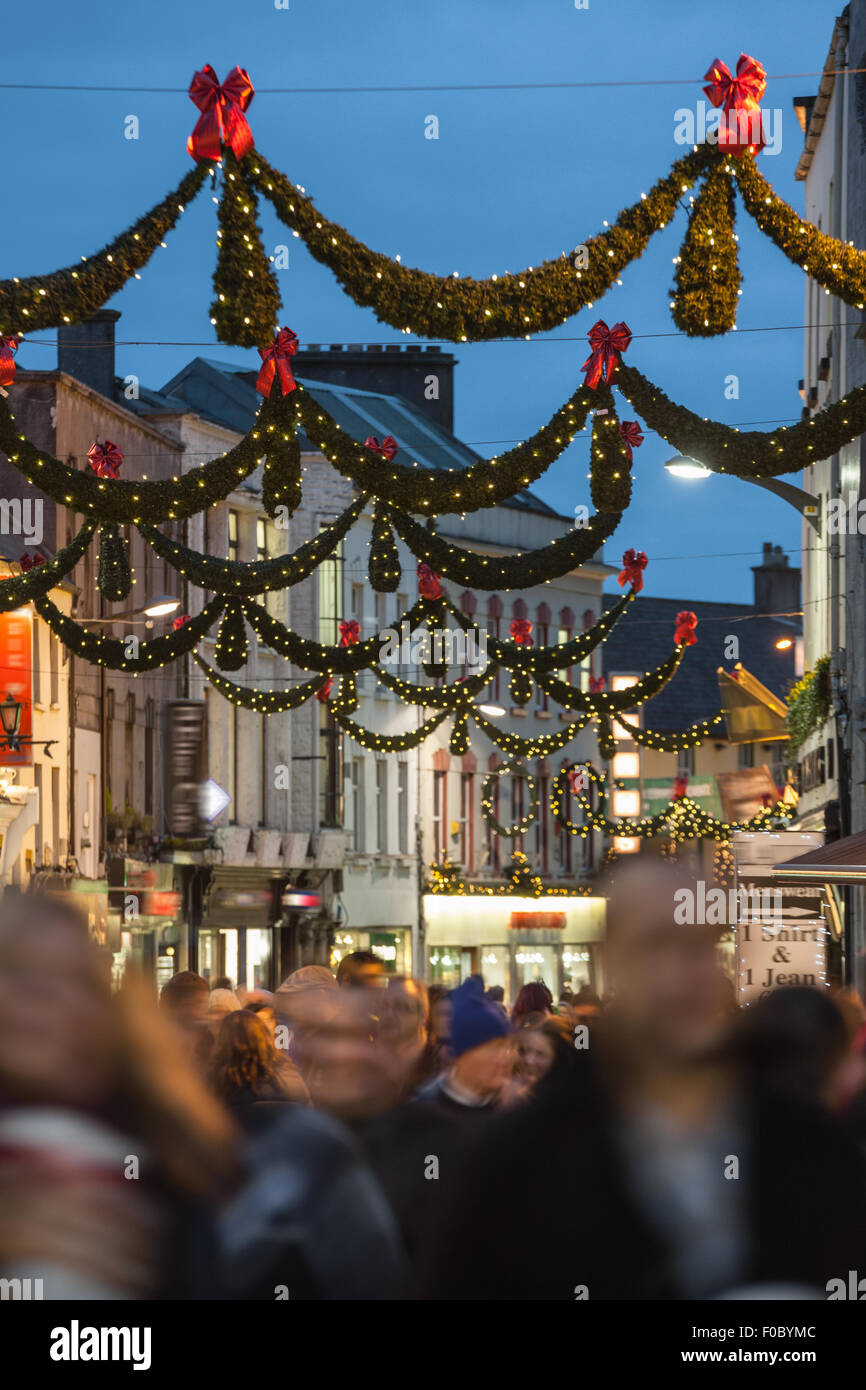 Shop street at night illuminated with Christmas lights, Galway, Ireland Stock Photo