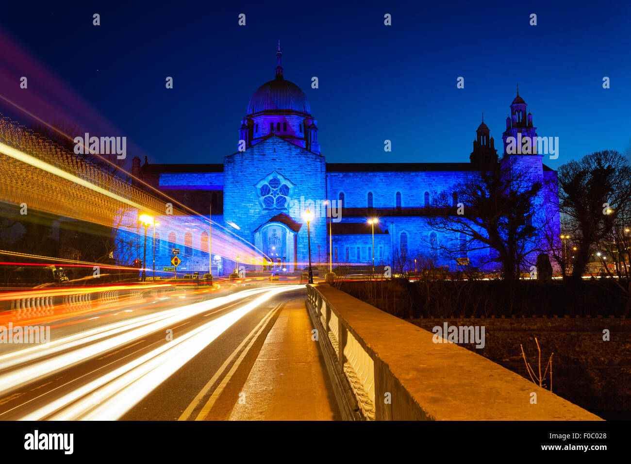 Galway Cathedral lit up blue at night and car lights trails Stock Photo Alamy