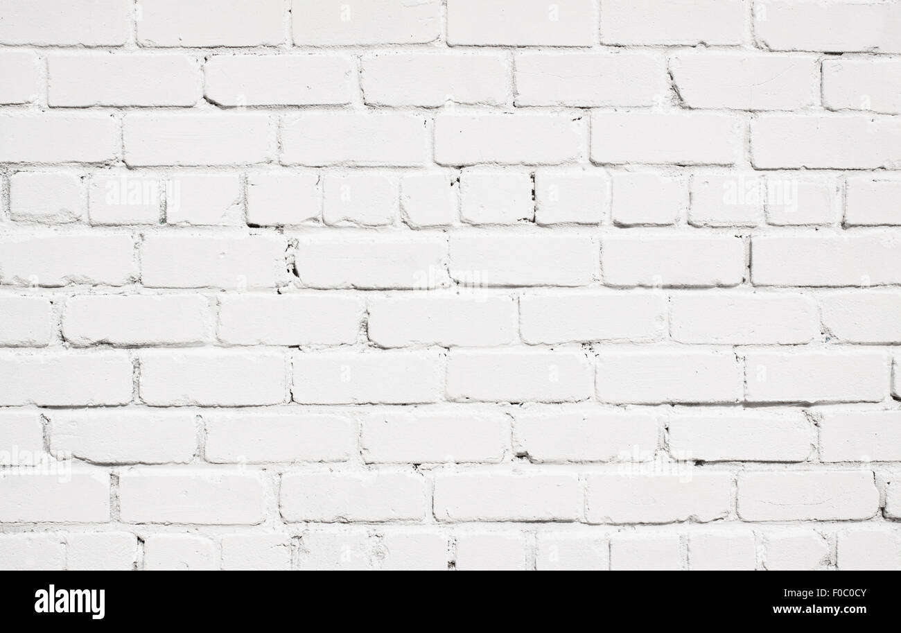 White brick wall texture with wooden floor Stock Photo