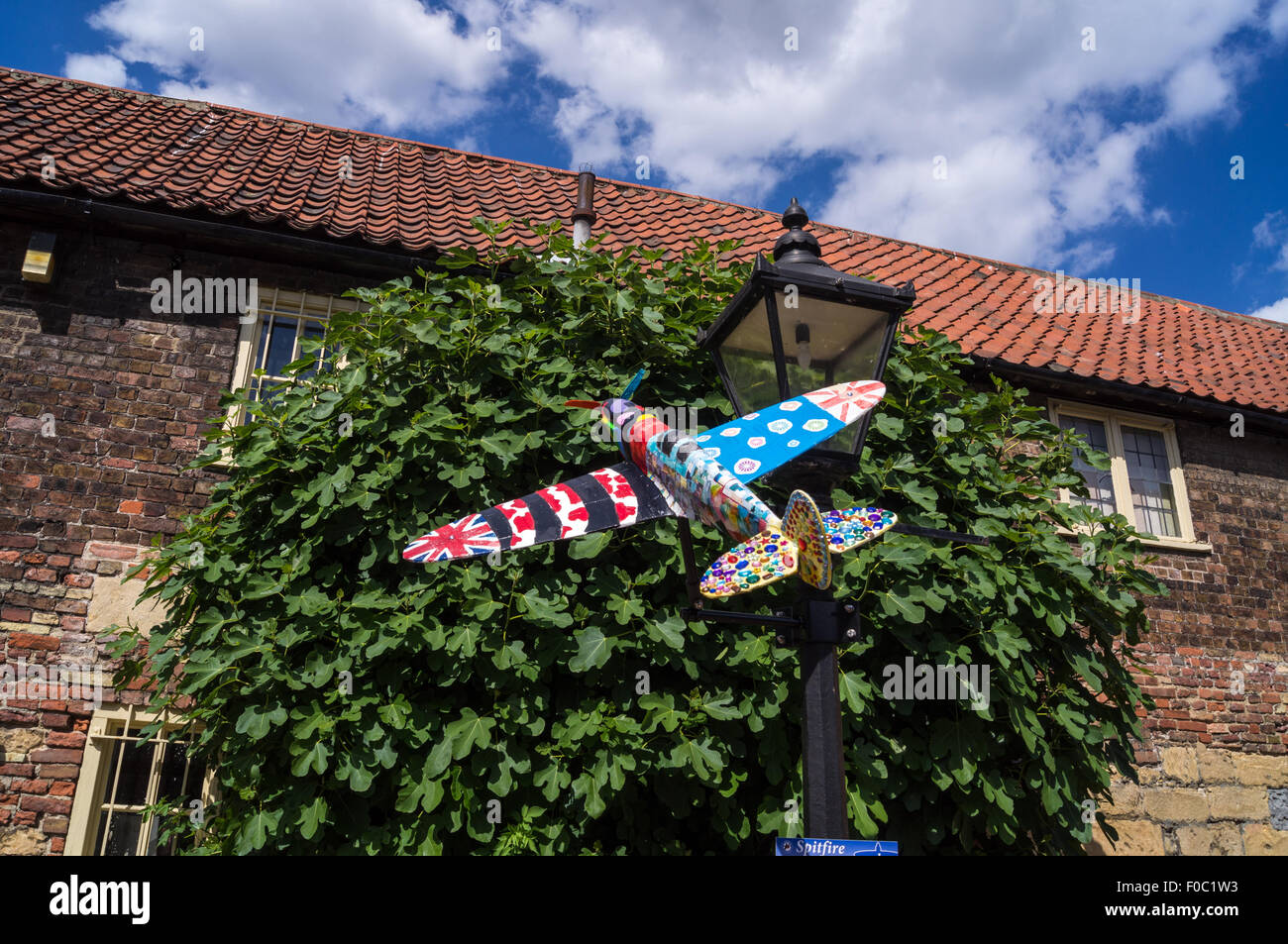 Decorated model of  Spitfire fighter aircraft on 'Spitfire Trail' commemorating Battle of Britain, King's Lynn  Norfolk, England Stock Photo