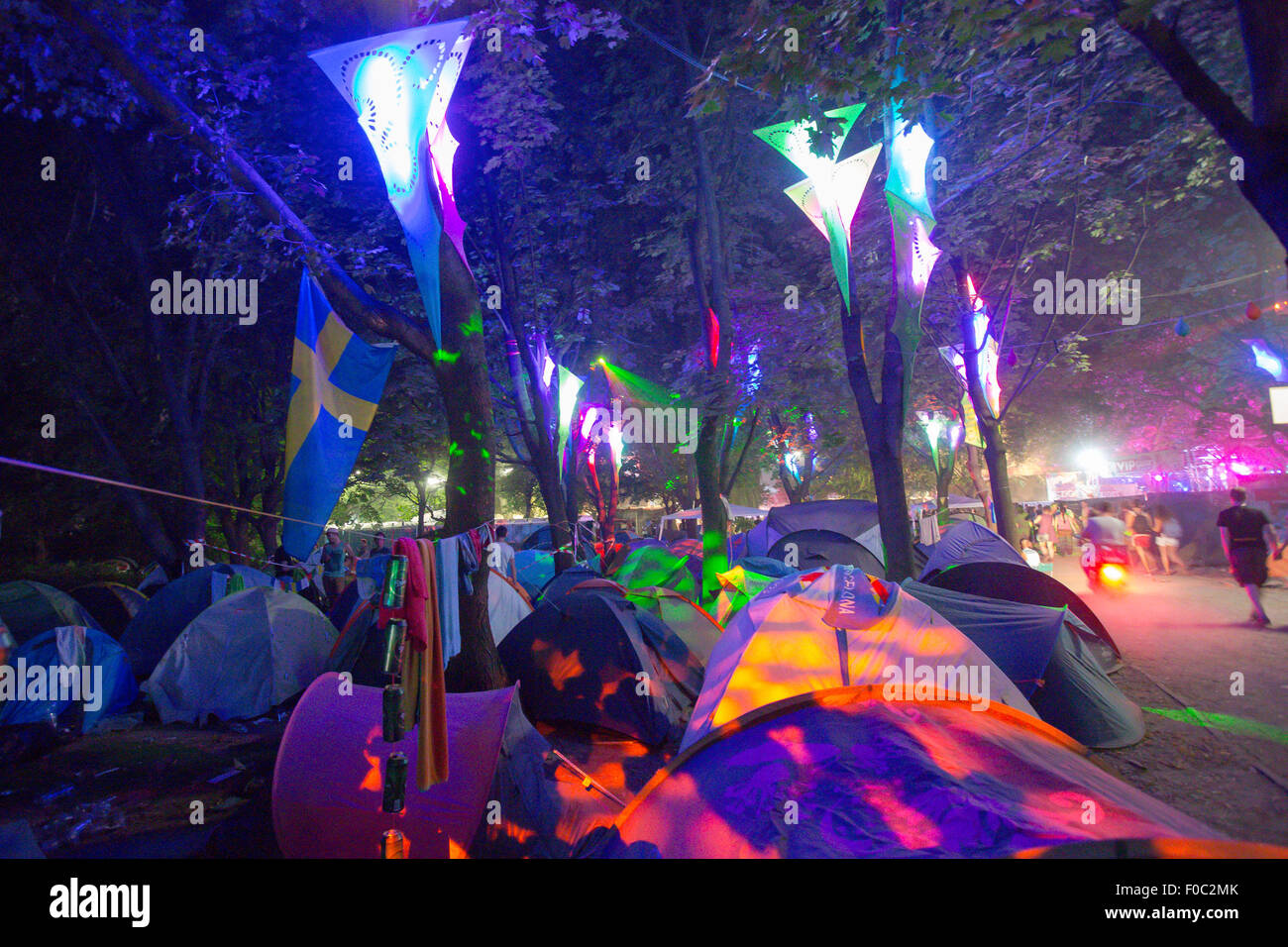 Budapest. 11th Aug, 2015. The tents of festival goers are illuminated by colourful lights during the Sziget (Hungarian for 'Island') Festival on the Obuda Island in Budapest, Hungary on Aug. 11, 2015. The 23rd Sziget Festival held from Aug. 10 to 17 is one of the largest music festivals in Europe. Credit:  Attila Volgyi/Xinhua/Alamy Live News Stock Photo