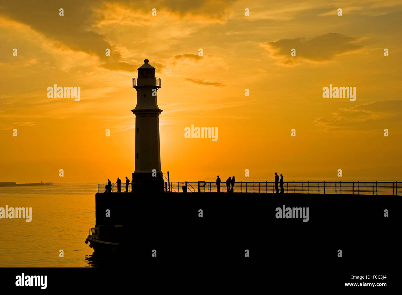Semi-Silhouette of Newhaven Lighthouse at dusk, Leith, Edinburgh, Scotland, UK, Europe Stock Photo