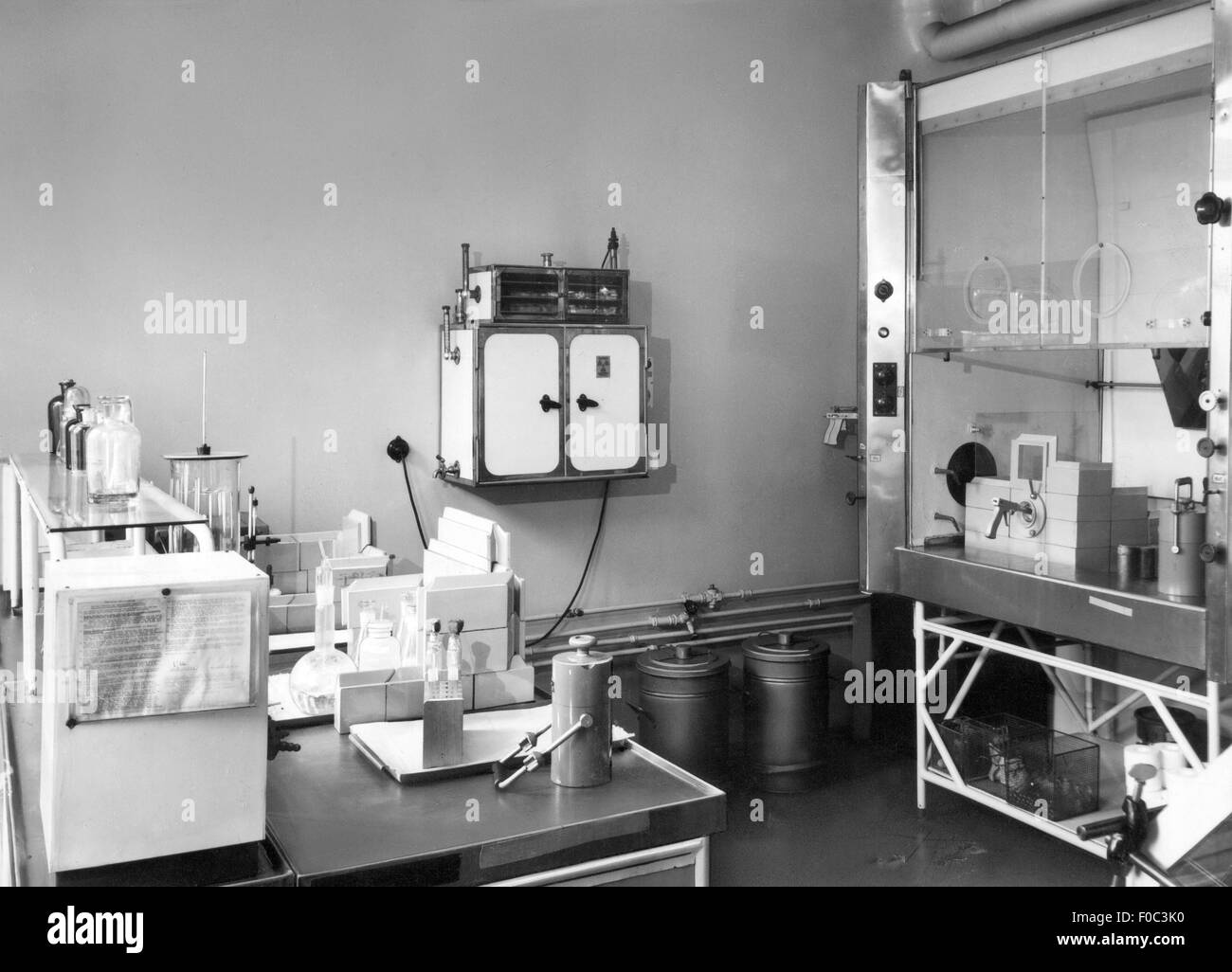 medicine,laboratory,radionuclide laboratory for the testing of radioactive preparations,German Pharmaceutical Institute,Berlin - Weissensee,20th century,20th century,Germany,East-Germany,East Germany,GDR,DDR,medicinal drug,medicament,pill,tablet,pills,tablets,nuclear medicine,radioactive,table,tables,vessel,vessels,container,containers,cupboard,cupboards,incubator,incubators,room,rooms,drug,medication,medications,orphan drugs,drug dispensing,preparation,compound,pharmaceutical,remedy,remedies,pharmaceutics,pharmacy,ph,Additional-Rights-Clearences-Not Available Stock Photo