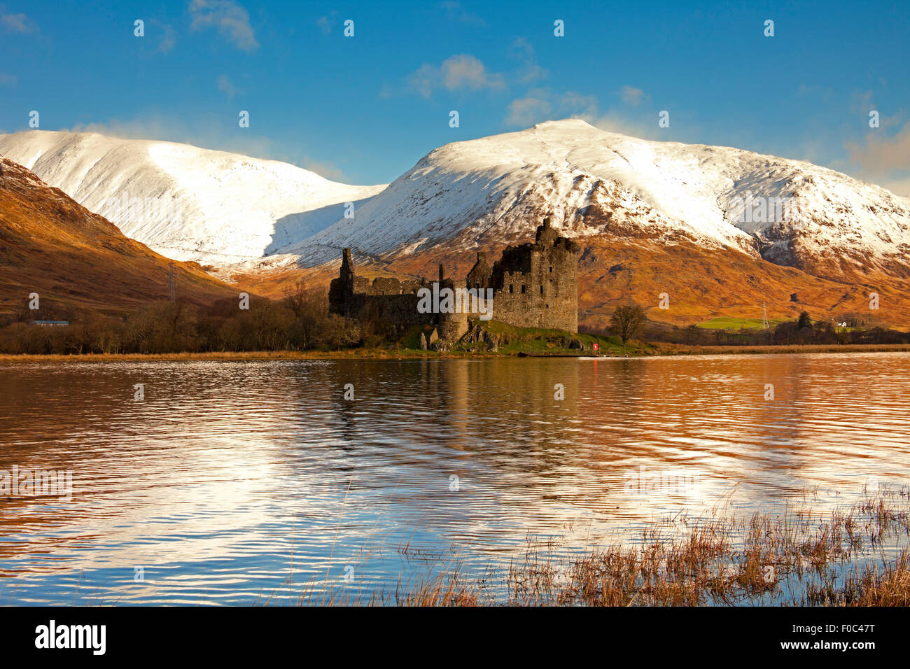 Kilchurn Castle Loch Awe with snow covered mountains, Scotland UK Stock Photo