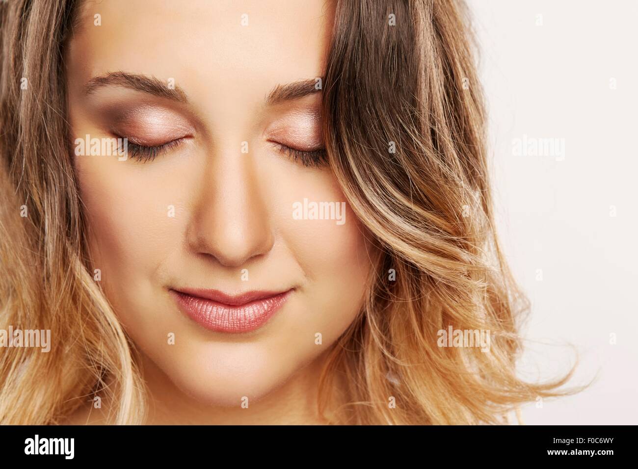 Young woman with eyes closed Stock Photo