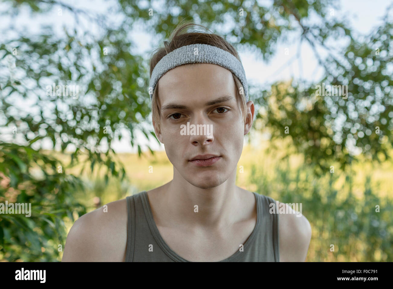 Portrait of handsome young man outdoors Stock Photo