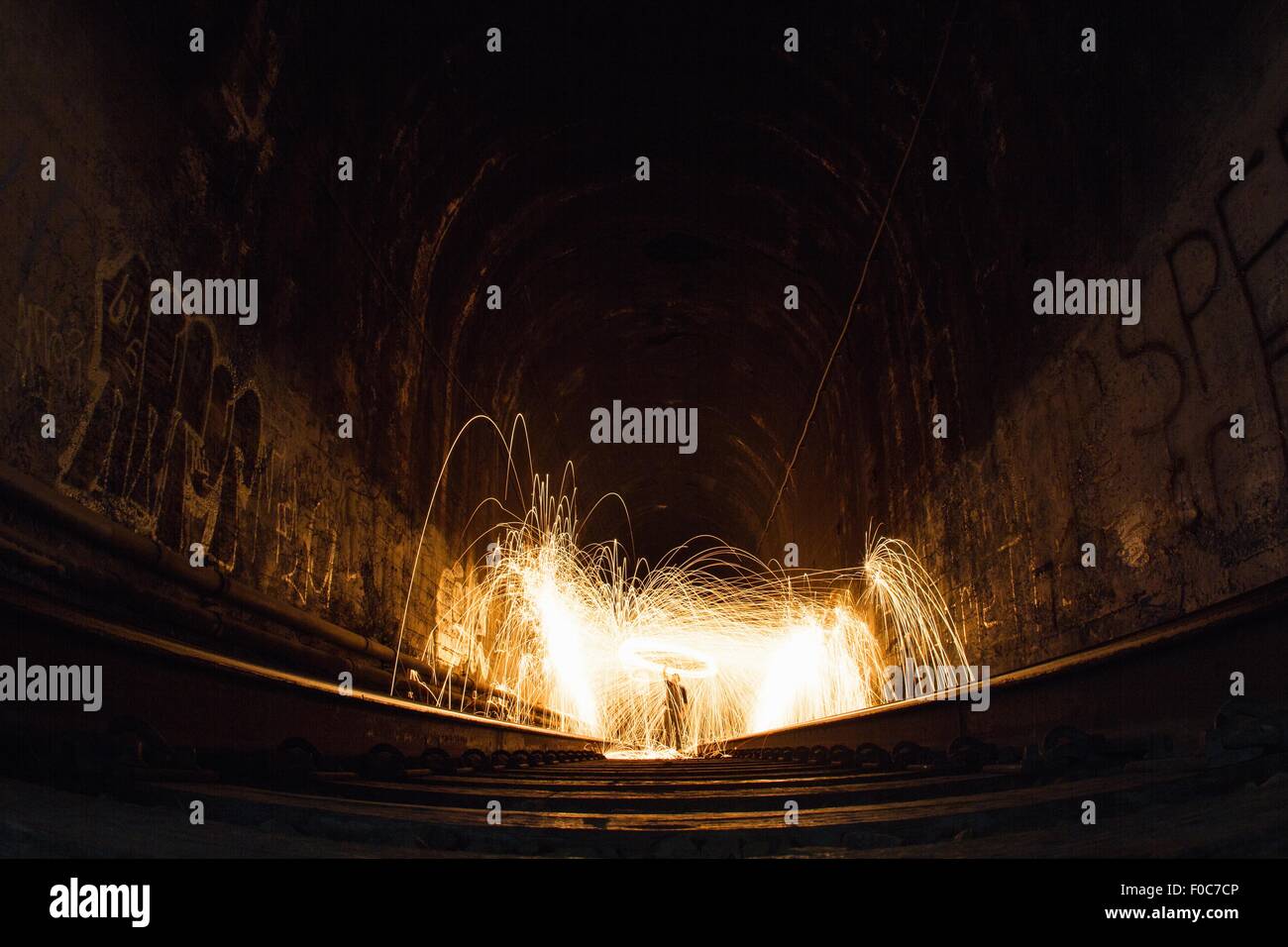 Train tunnel with light trails, low angle view Stock Photo