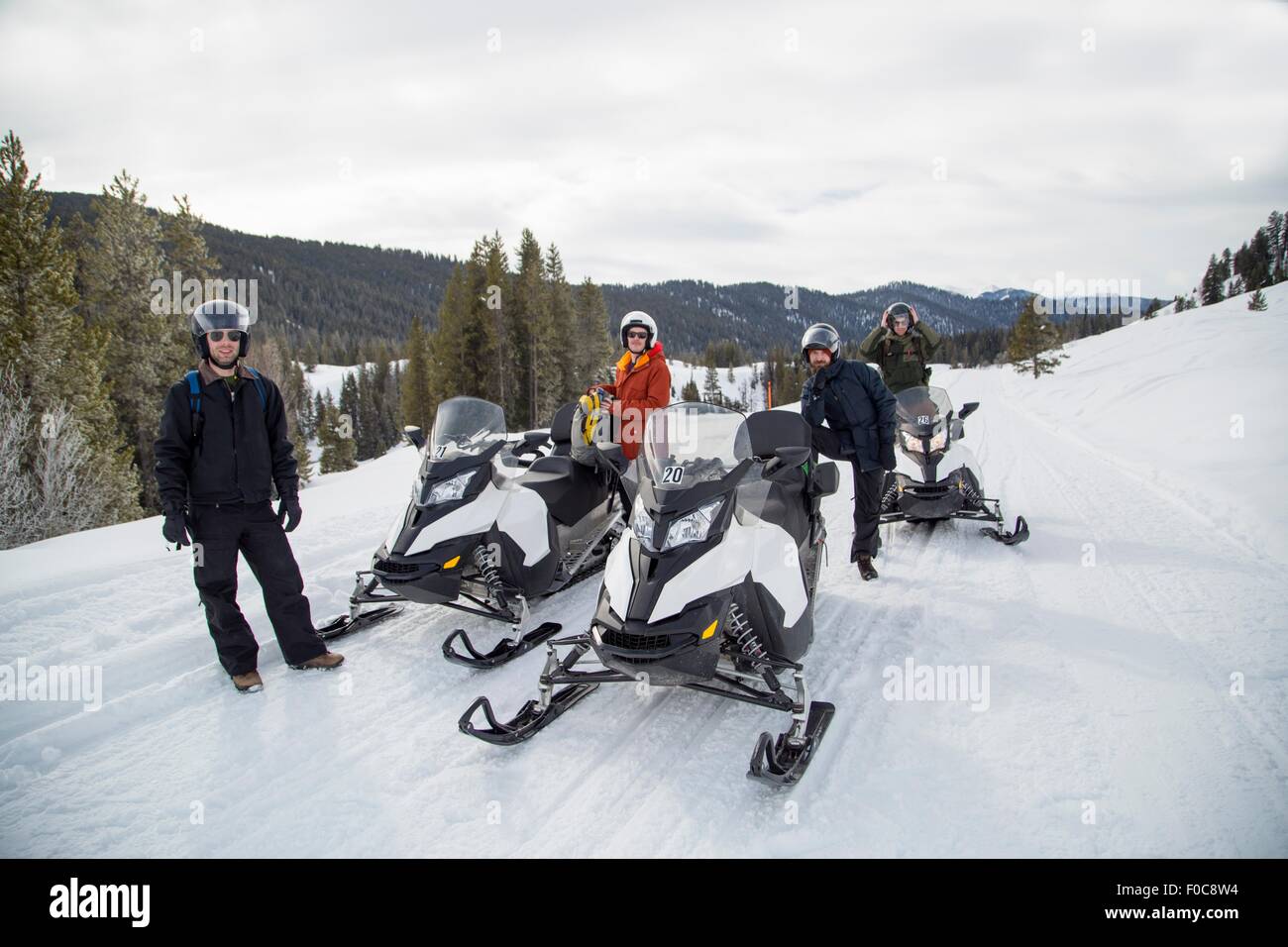 Friends on snowmobile, Jackson Hole, Wyoming Stock Photo