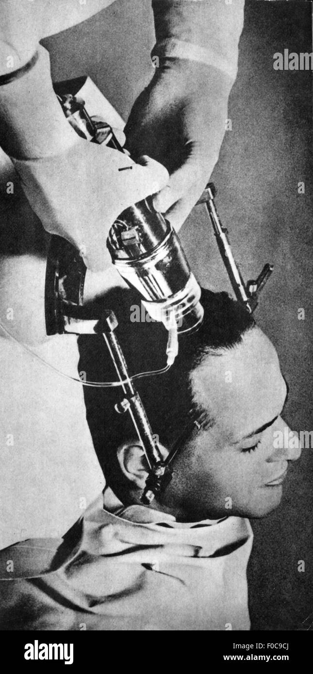 medicine, operation, brain and neurosurgery, execution of a lobotomy with an ultrasonic unit, 20th century, 20th century, undergo surgery, need surgery, brain surgery, psychiatry, mental disease, psychopathy, ultrasonic unit, instrument, instruments, device, devices, ultrasonics, holding, hold, head, heads, patient, patients, lying, operating, operate, treatment, treatments, treat, treating, doctor, doctoring, therapy, therapies, lobotomy, medicine, medicines, operation, operations, execution, executions, historic, historical, people, Additional-Rights-Clearences-Not Available Stock Photo