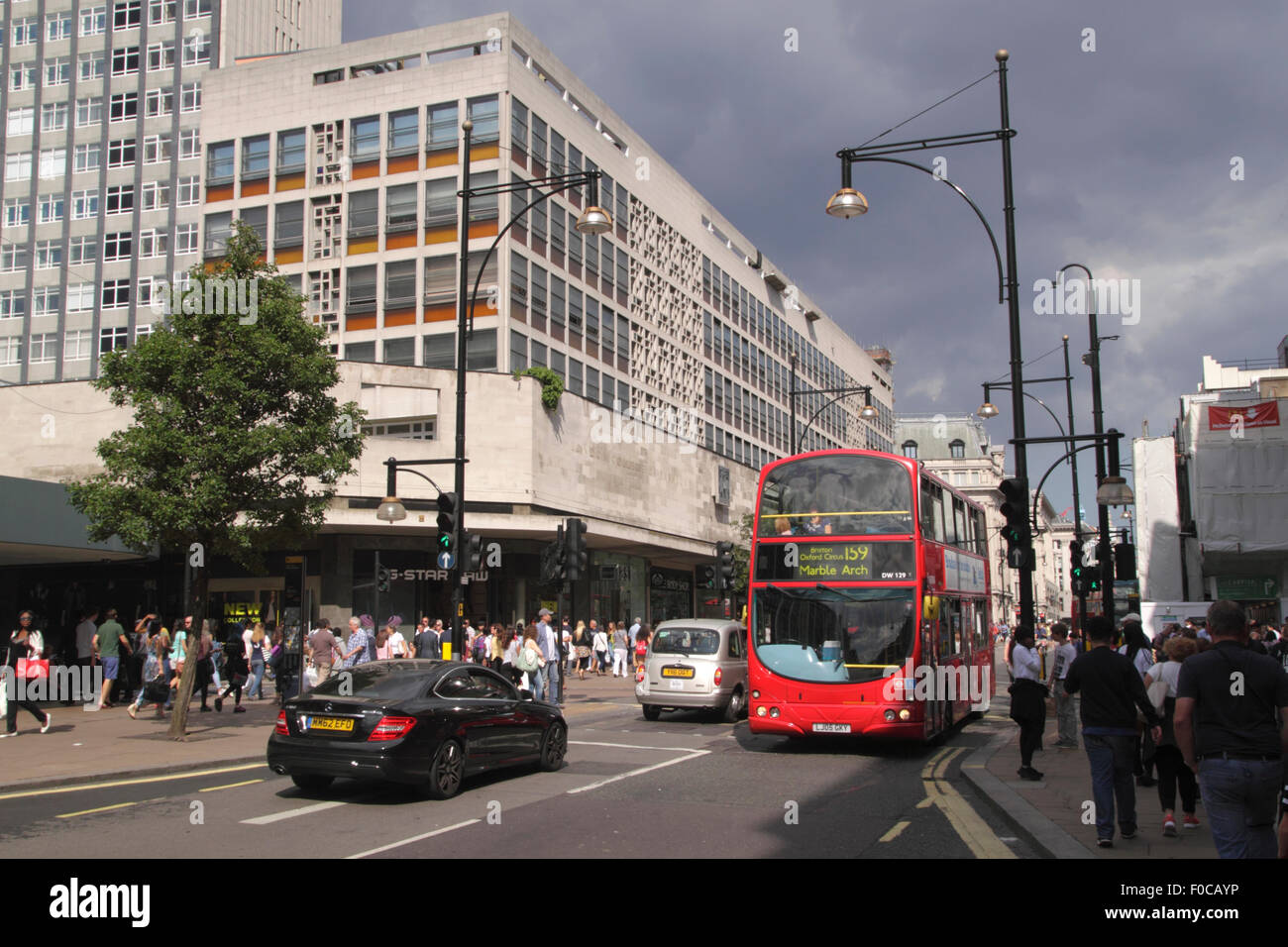 Oxford Street London College of Fashion on left August 2015 Stock Photo