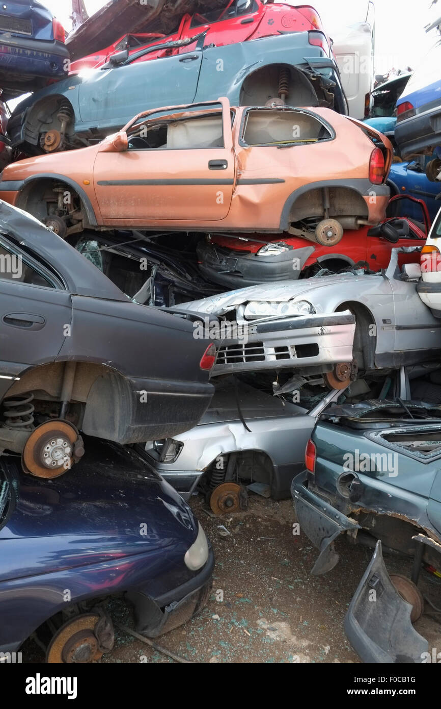 Cars stacked in scrap yard Stock Photo Alamy