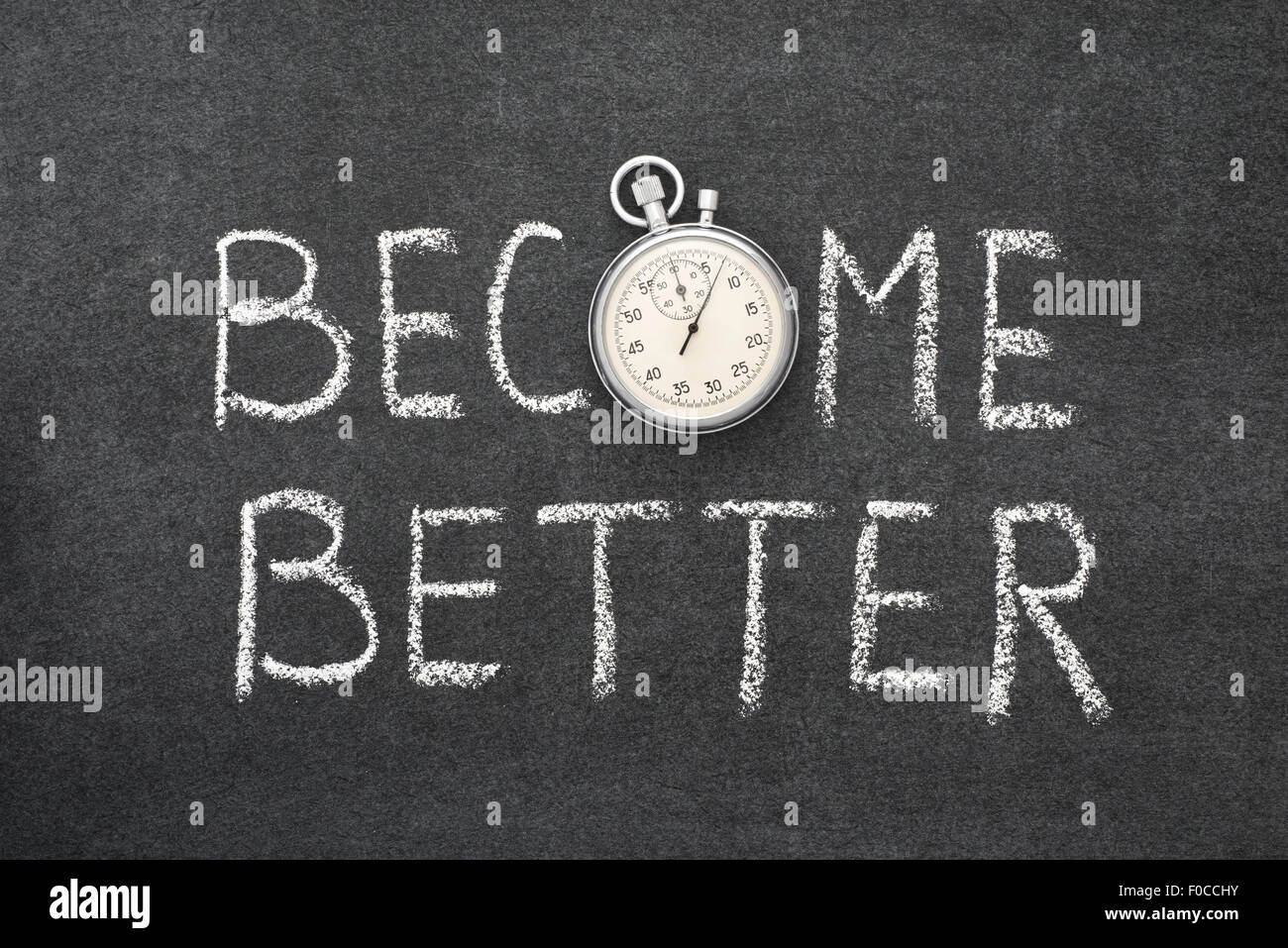 become better phrase handwritten on chalkboard with vintage precise stopwatch used instead of O Stock Photo