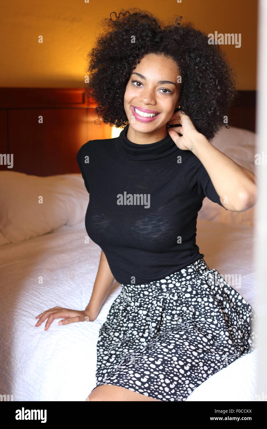 Happy black woman afro hi-res stock photography and images - Alamy