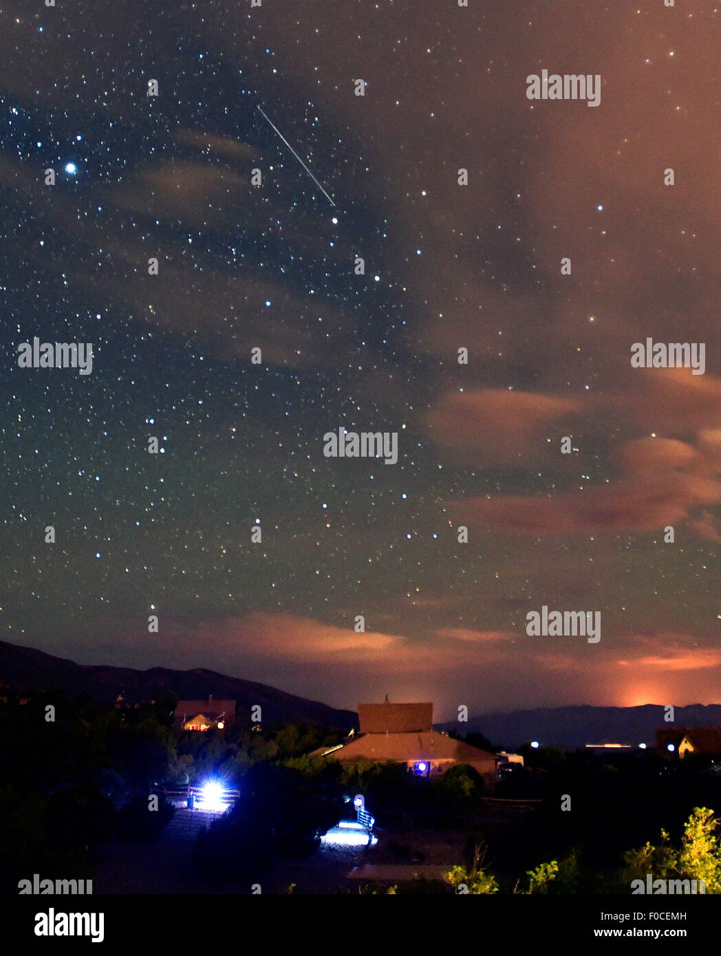 Cold Creek, Nevada, USA. 12th Aug, 2015. A Perseid meteor streaks