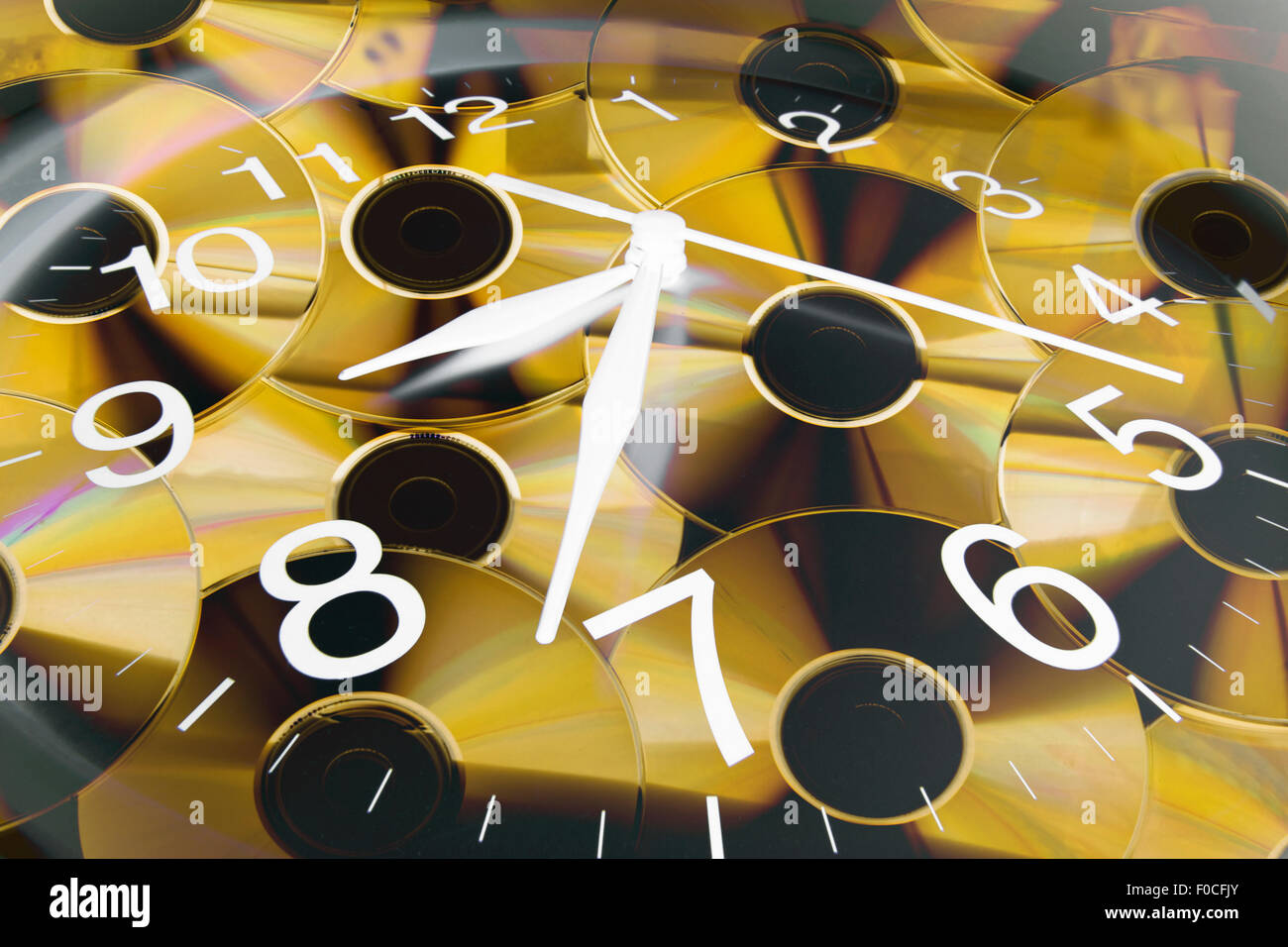 Clock and CDs Stock Photo - Alamy