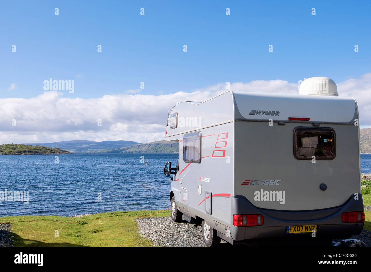 Hymer Motorhome in campsite overlooking bay and Sound of Mull. Craignure Isle of Mull Inner Hebrides Western Isles Scotland UK Stock Photo