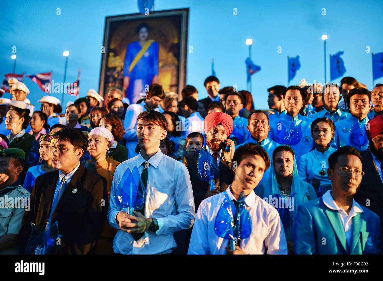 Bangkok, Thailand. 12th Aug, 2015. People attend an event celebrating Queen Sirikit's 83rd birthday at the Sanam Luang square in Bangkok, Thailand, on Aug. 12, 2015. Thailand on Wednesday observed the 83rd birthday of Queen Sirikit. © Li Mangmang/Xinhua/Alamy Live News Stock Photo