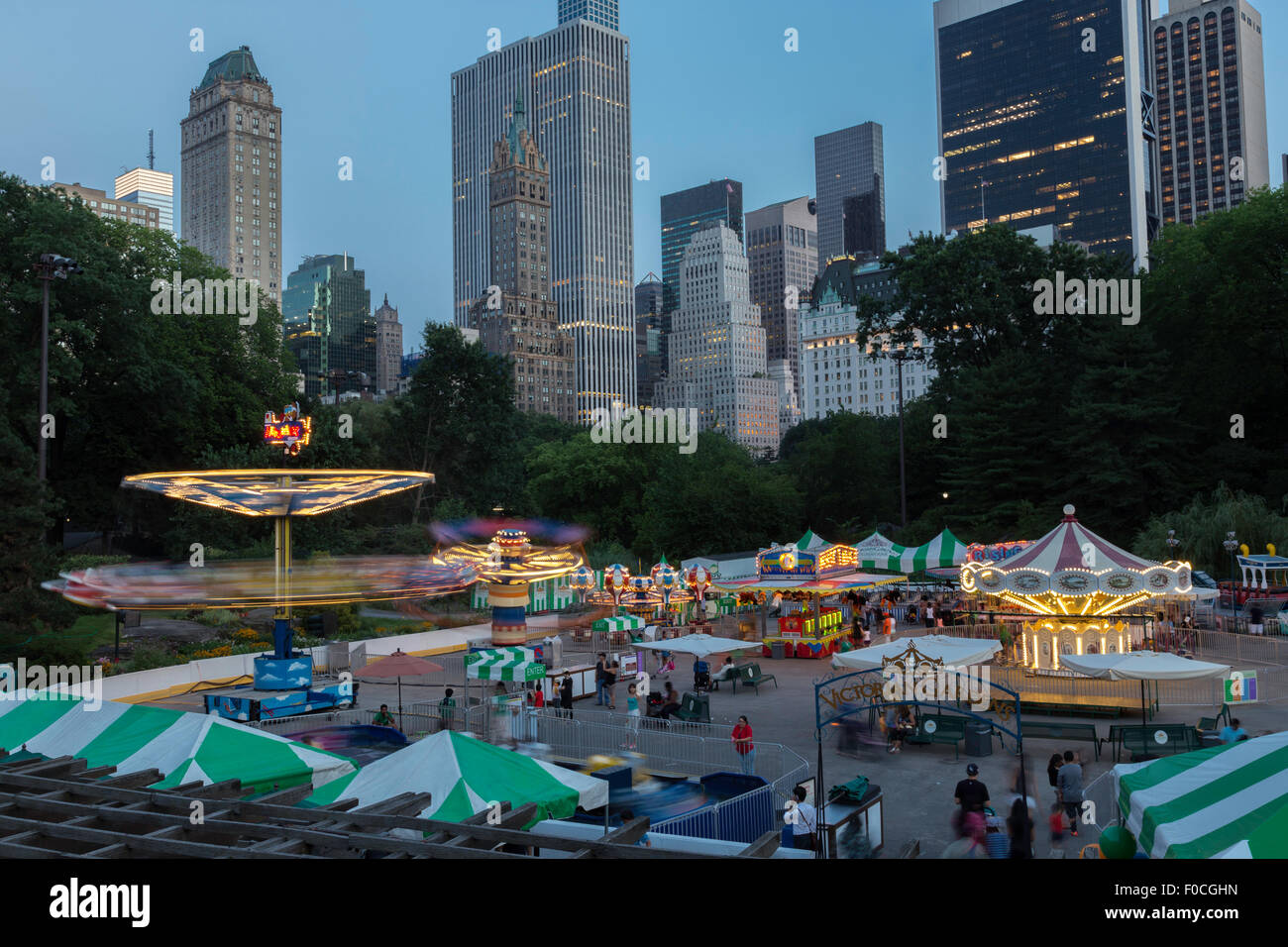 Victorian Gardens Carnival Rides In Central Park With Skyline In