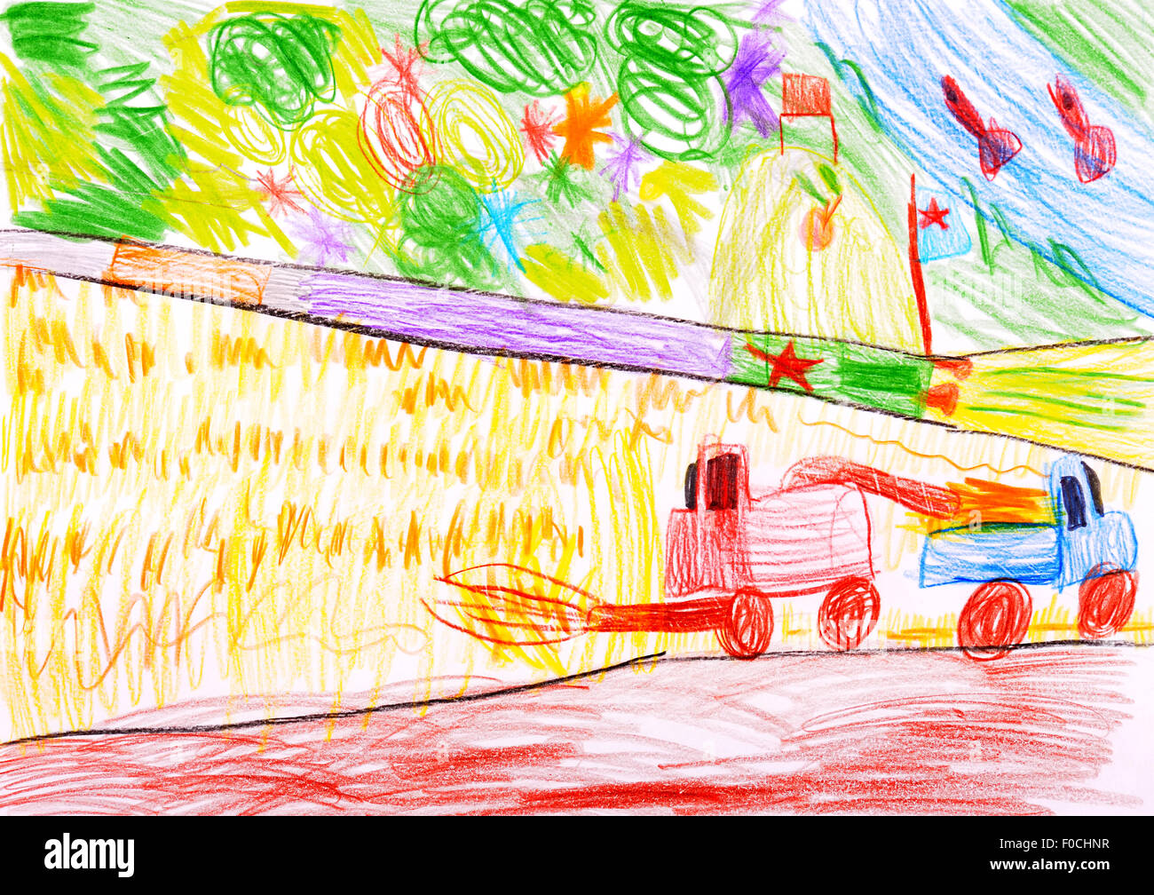child's drawing. Combine harvesting a wheat and space rocket. Stock Photo