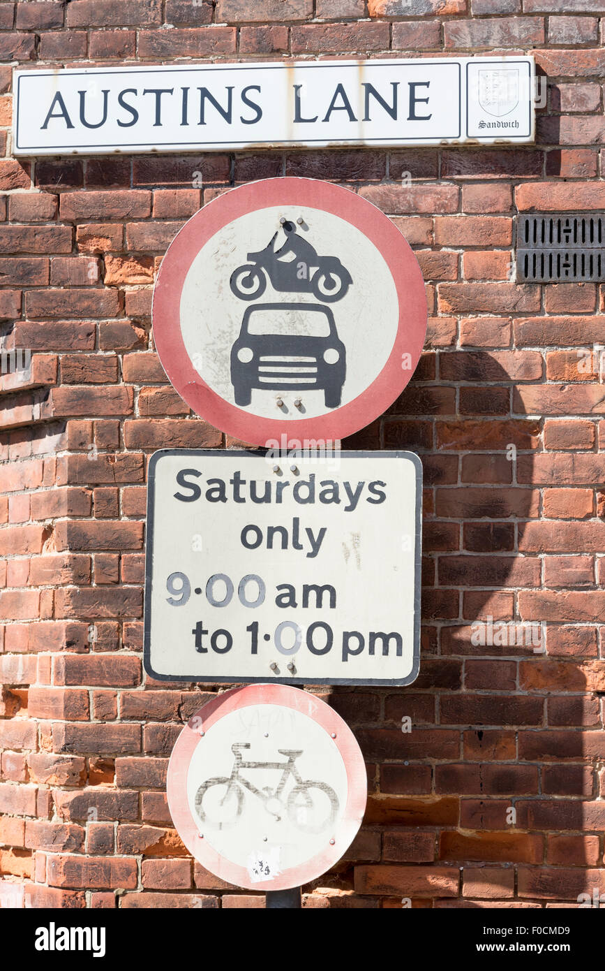 Road signs at a street corner in Sandwich, Kent Stock Photo