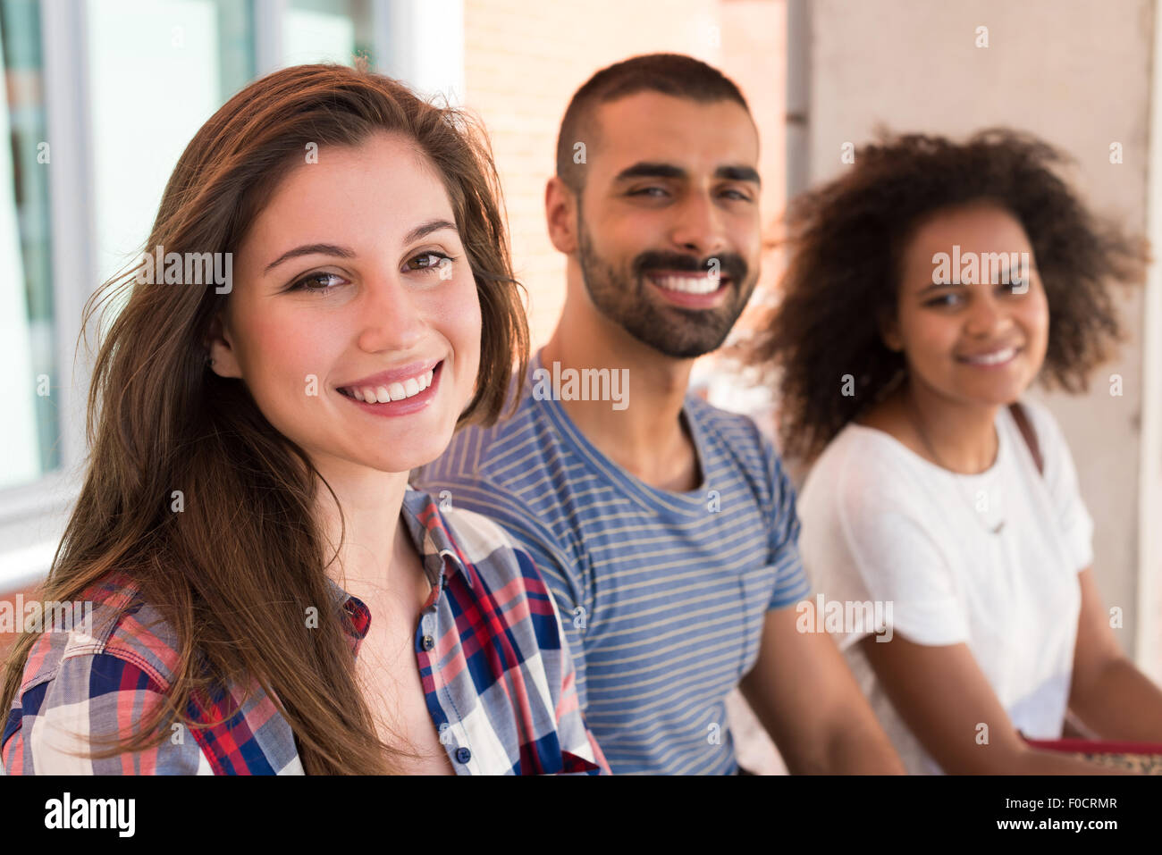 Multi-Ethnic group of students in School Campus Stock Photo - Alamy