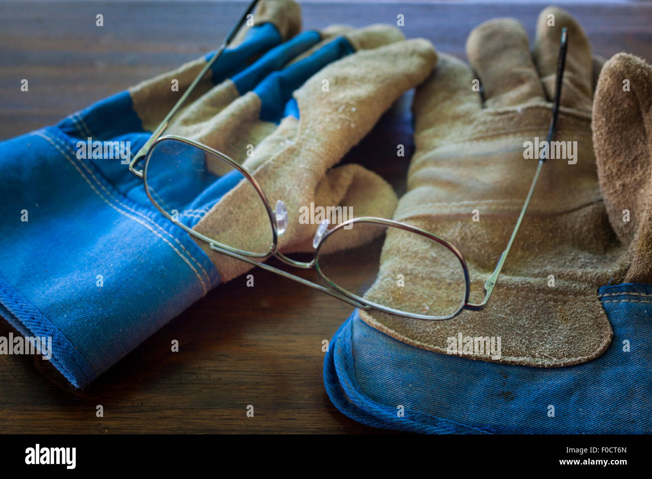 Work Gloves and eye glasses Stock Photo