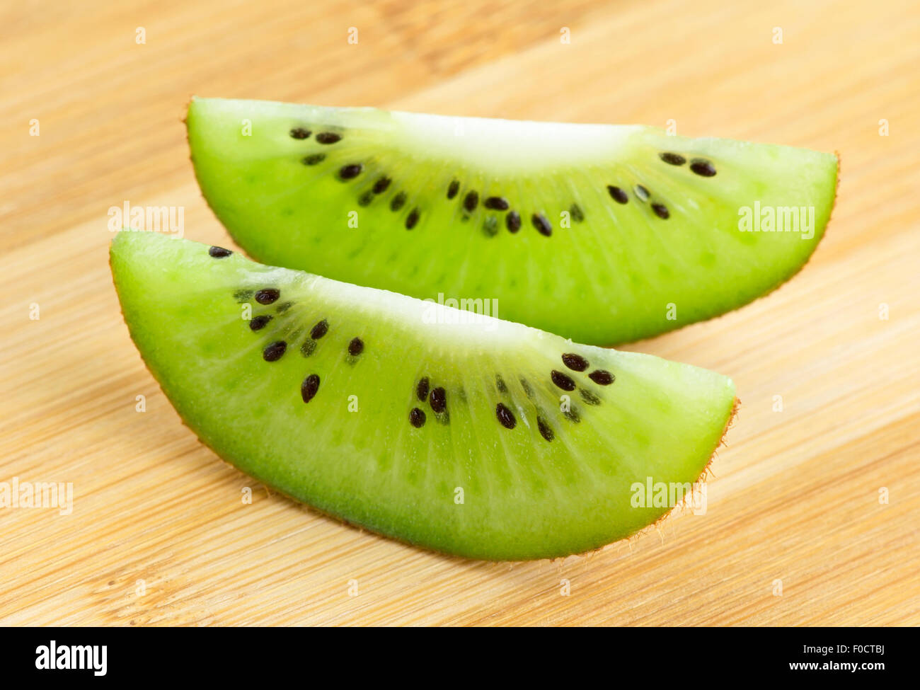 Background kiwi sliced closeup Stock Photo - Alamy