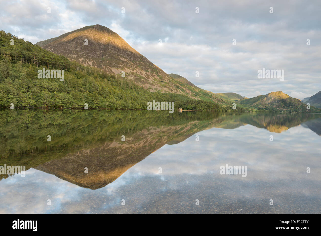Grasmoor and Rannerdale Knotts reflected in Crummock Water in the English Lake District national park Stock Photo