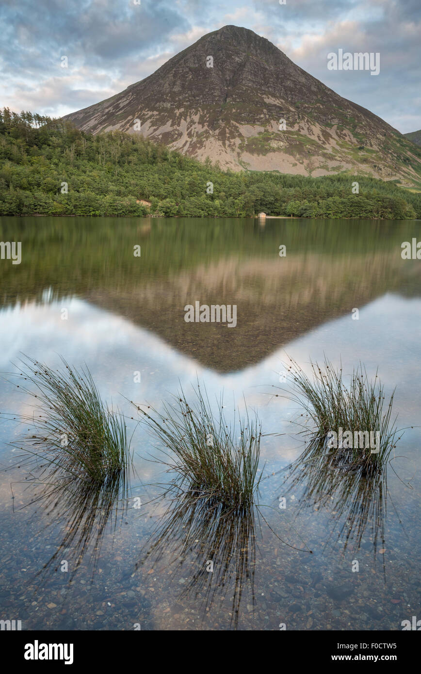 Grasmoor reflected in Crummock Water in the English Lake District national park Stock Photo