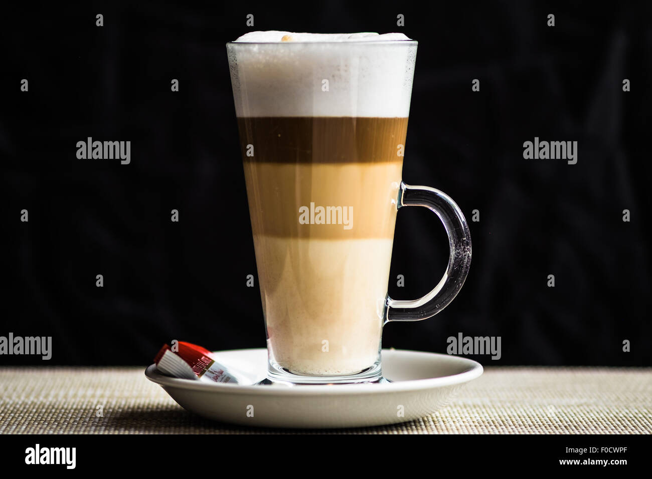layered latte coffee in a glass mug Stock Photo Alamy