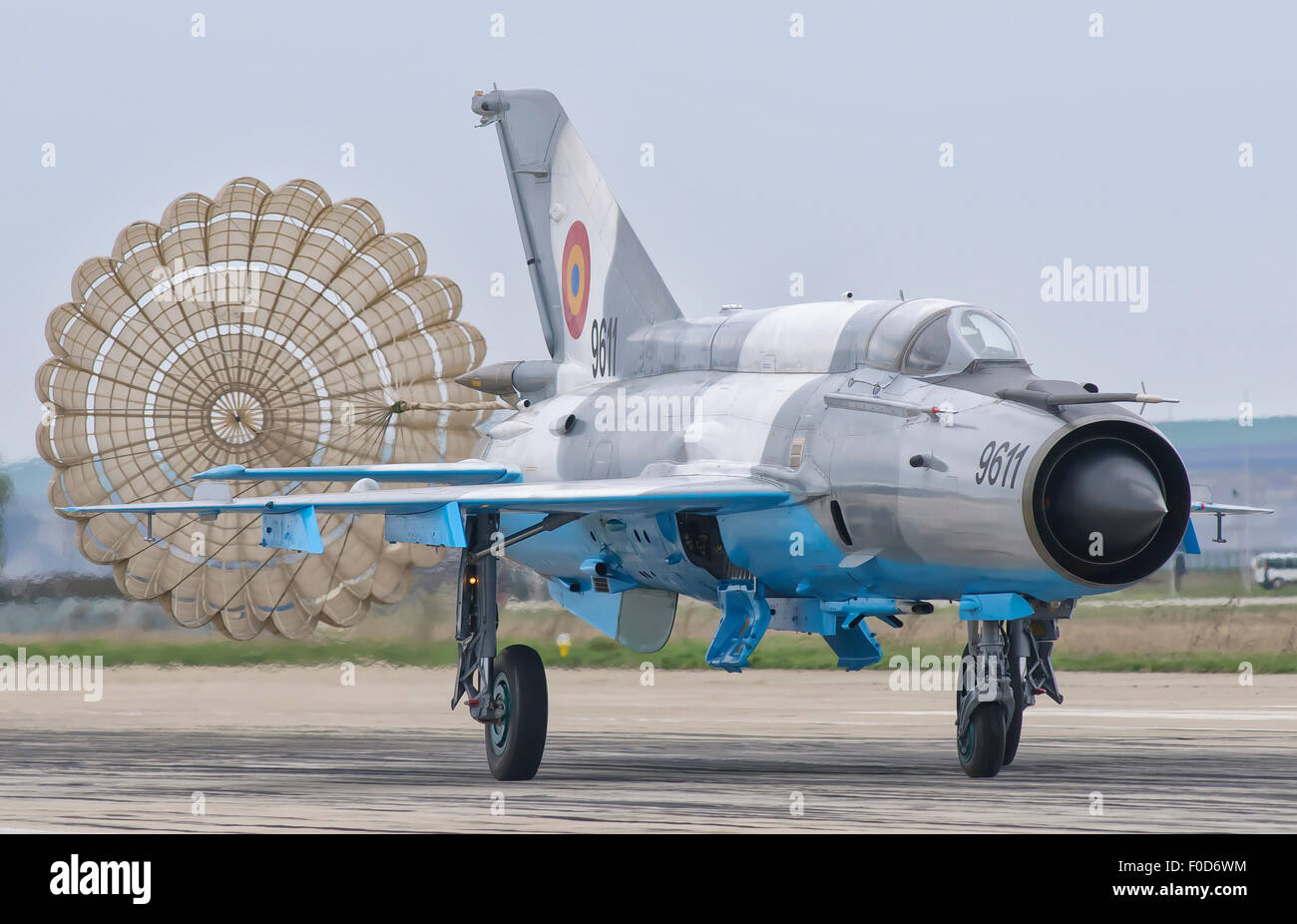 A Romanian Air Force MiG-21C with parachute deployed at Camp Turzii Air Base, Romania. Stock Photo