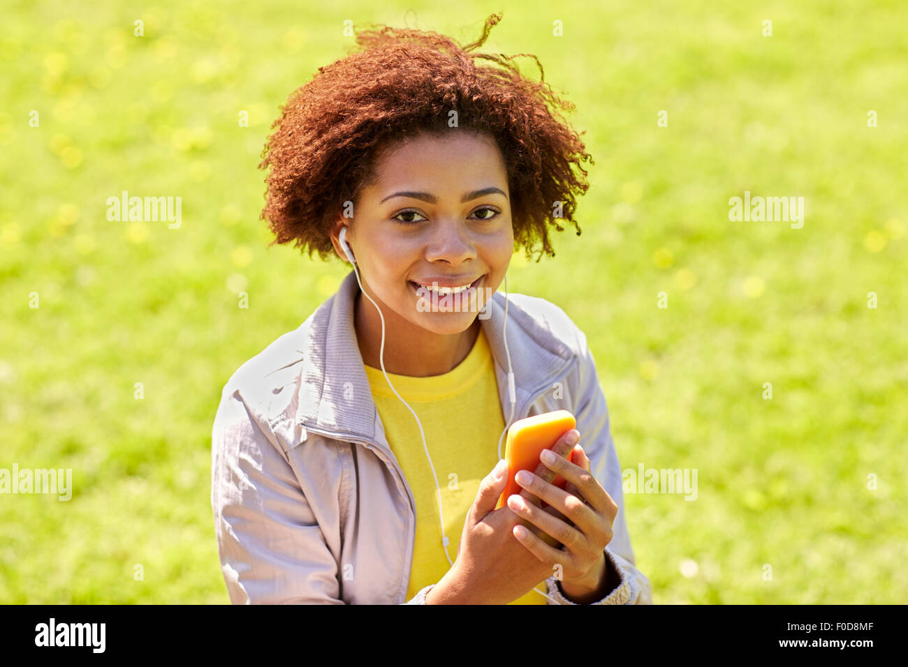 Happy african woman hi-res stock photography and images - Alamy