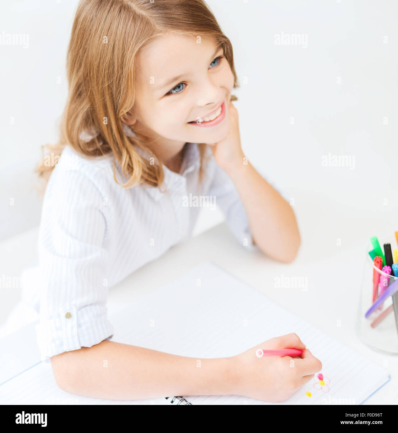 little student girl drawing at school Stock Photo - Alamy