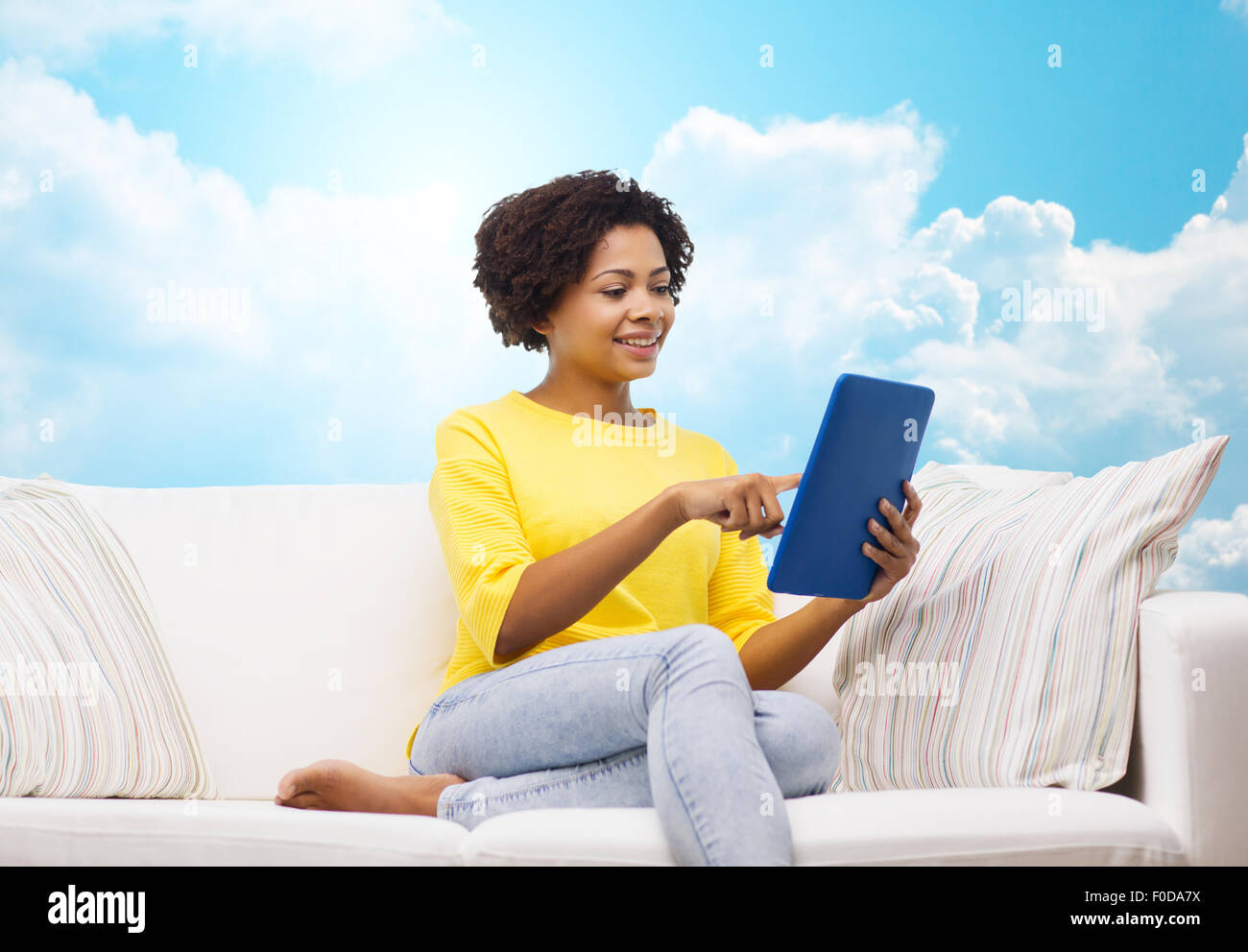 happy african american woman with tablet pc Stock Photo - Alamy