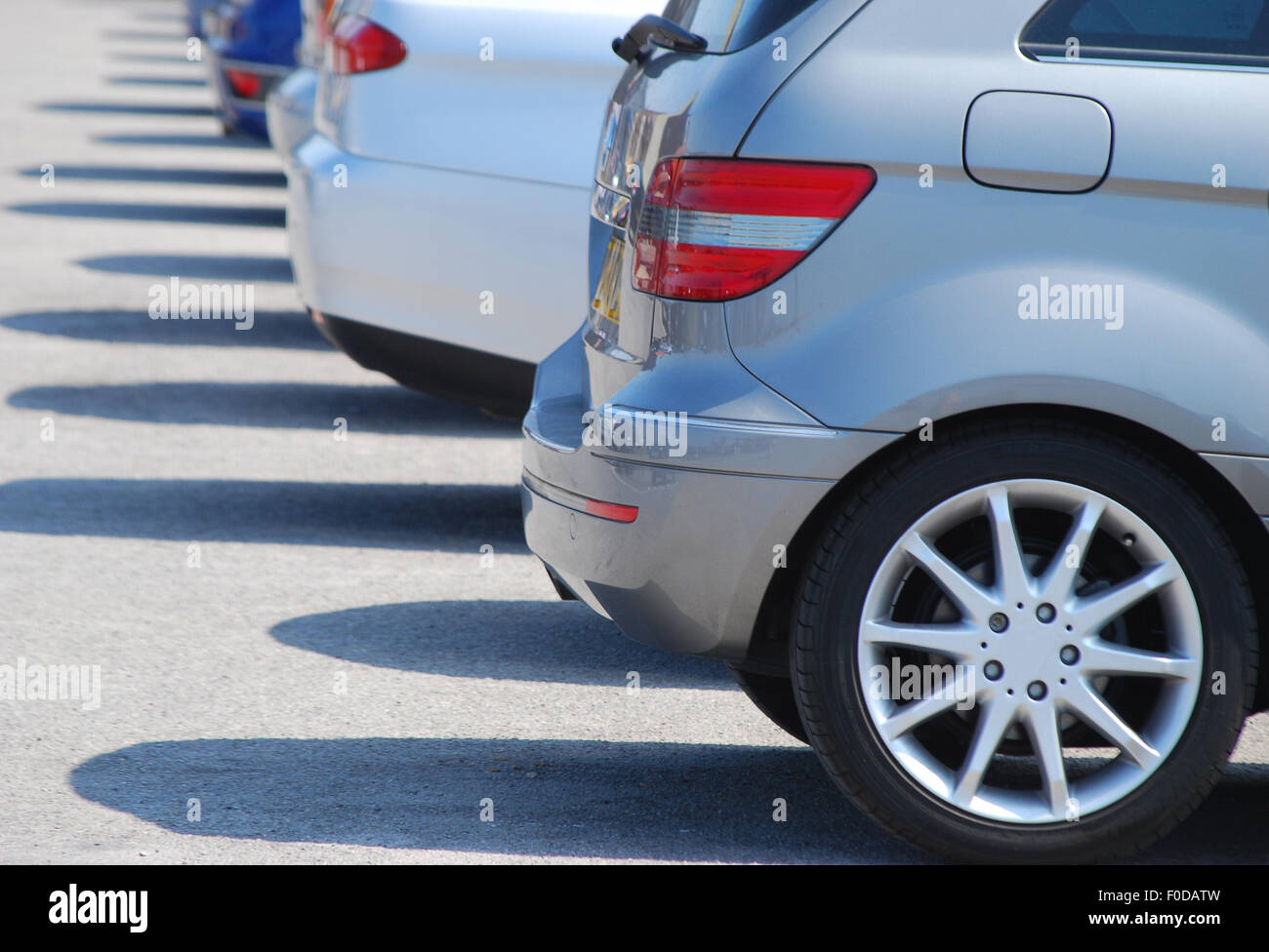 Telephoto view of row of parked cars Stock Photo