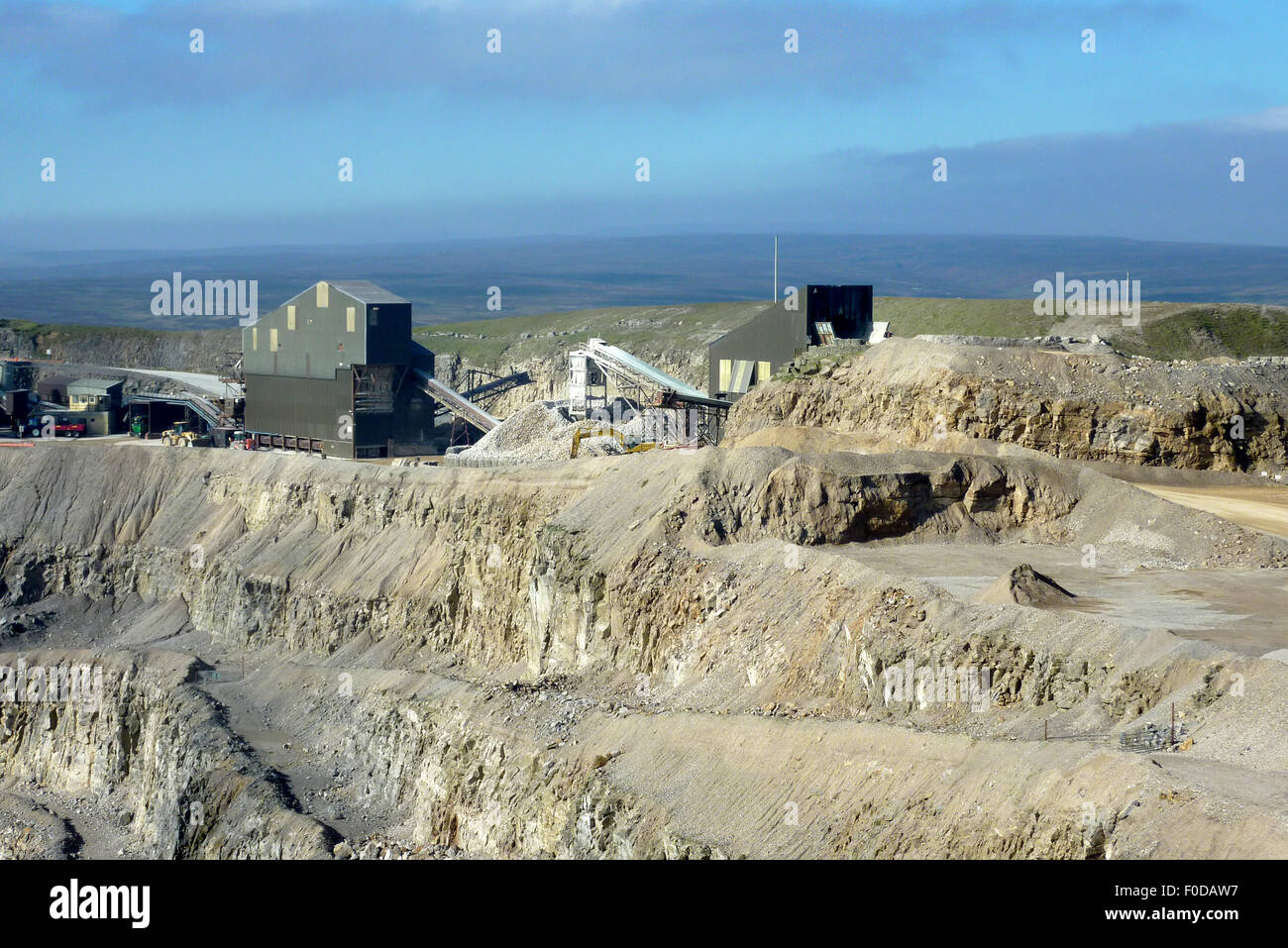 View of stone quarry showing mining equipment. Stock Photo