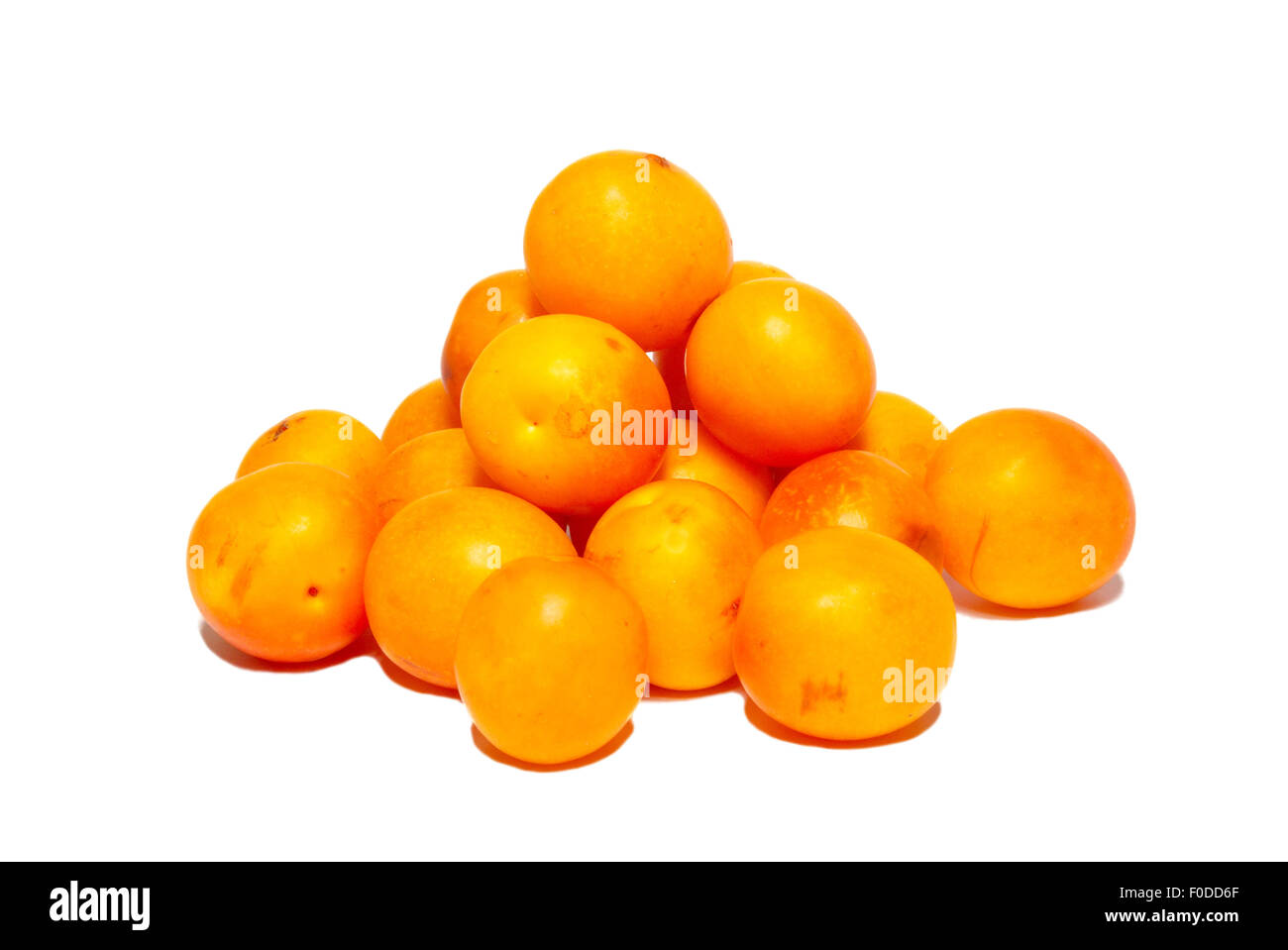 Pile of yellow fresh plums. Stock Photo