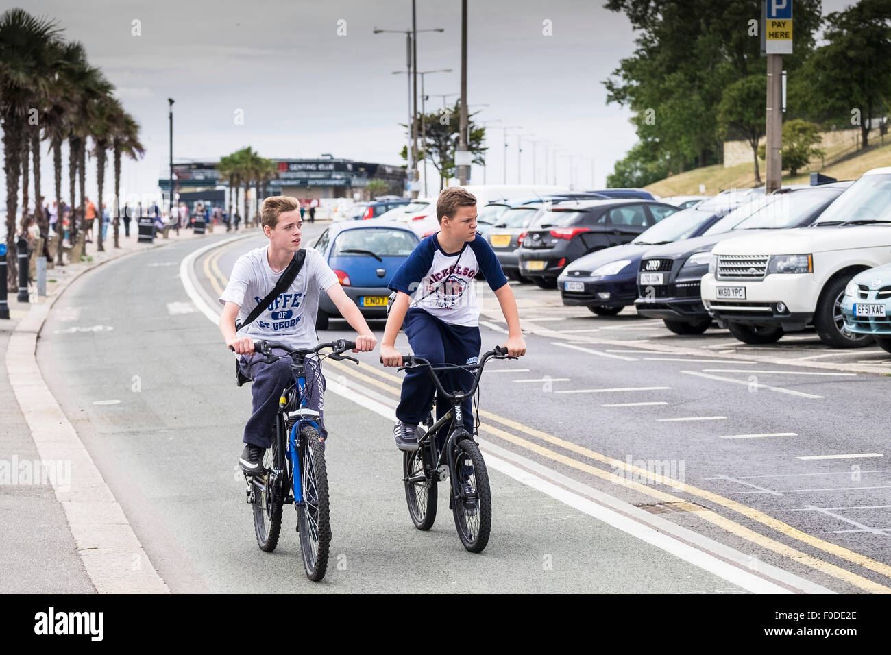 Cyclists using the cycle lane on Southend seafront in Essex. Stock Photo