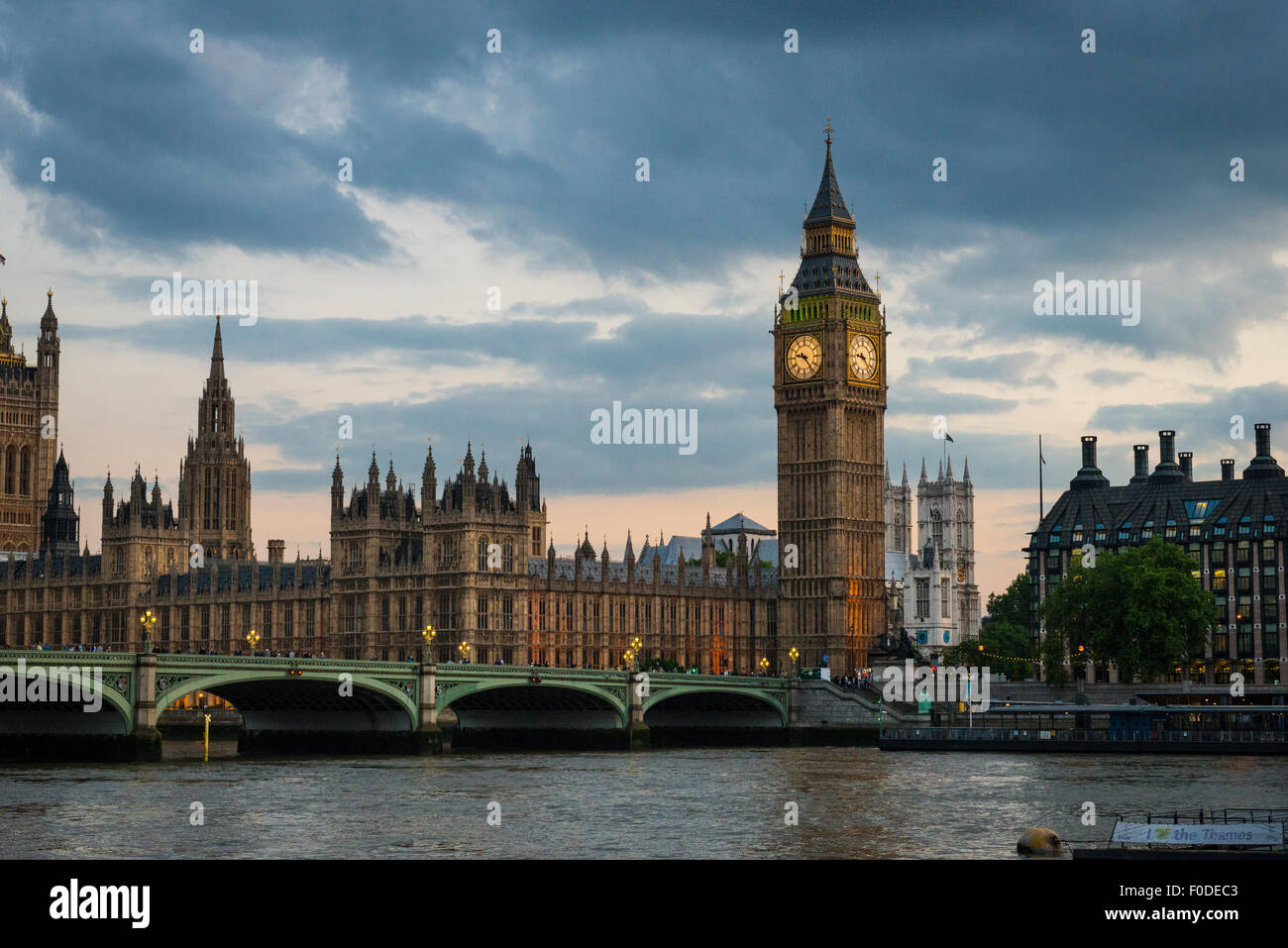 London Southbank Palace Of Westminster Big Ben Elizabeth Tower previously Clock or St Stephens Tower Cathedral Bridge at dusk Stock Photo