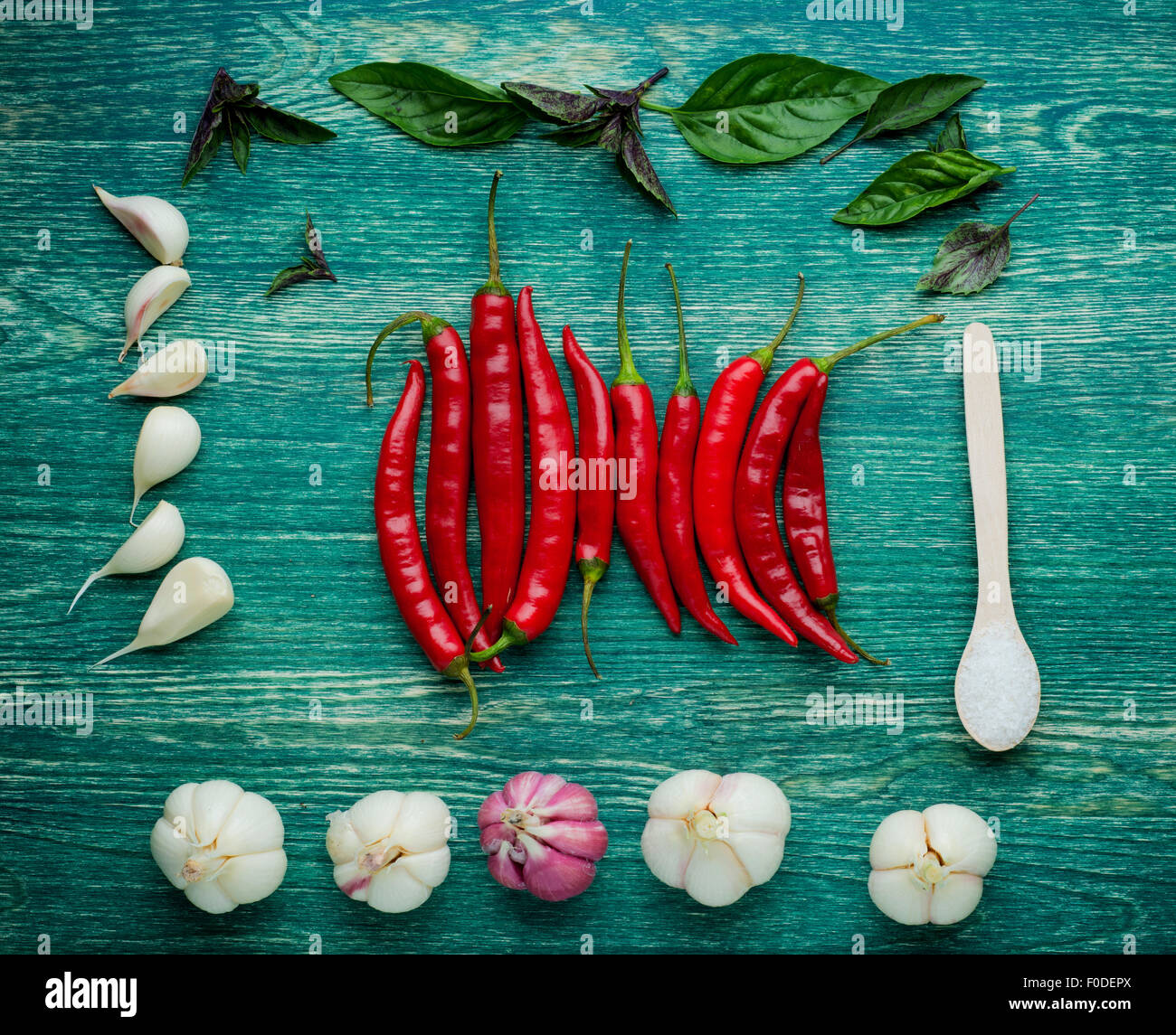 Red hot chili peppers on wooden background Stock Photo - Alamy