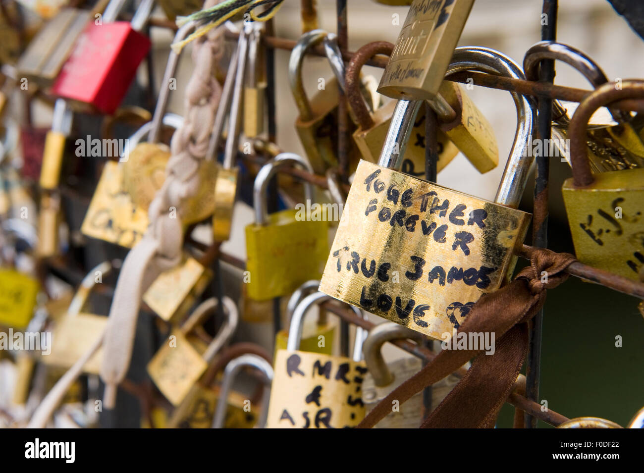 Thousands of padlocks on a fence near the Pont des Arts symbolize 'love