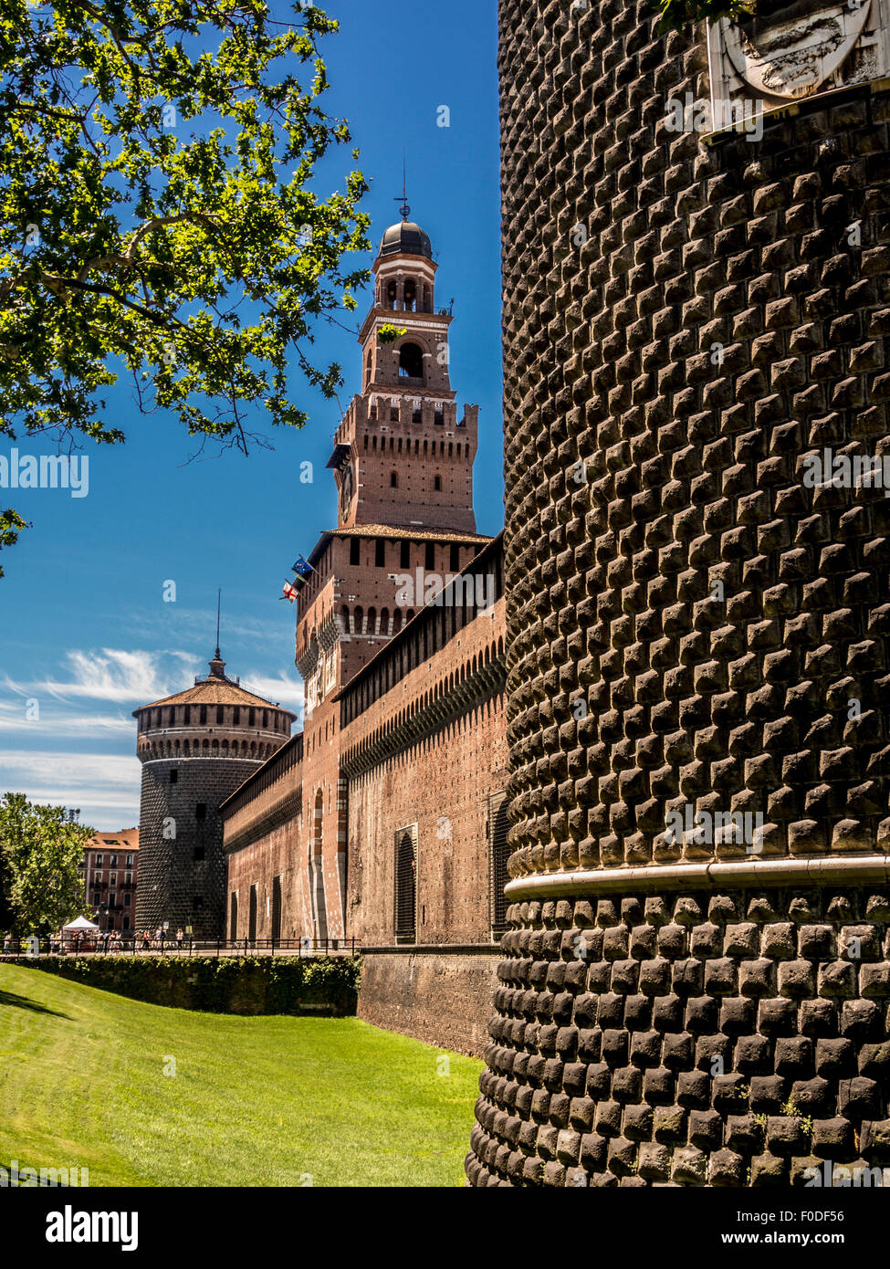 The Round tower and  Filarete tower in perimeter walls of  Castello Sforzesco, Milan, Italy Stock Photo