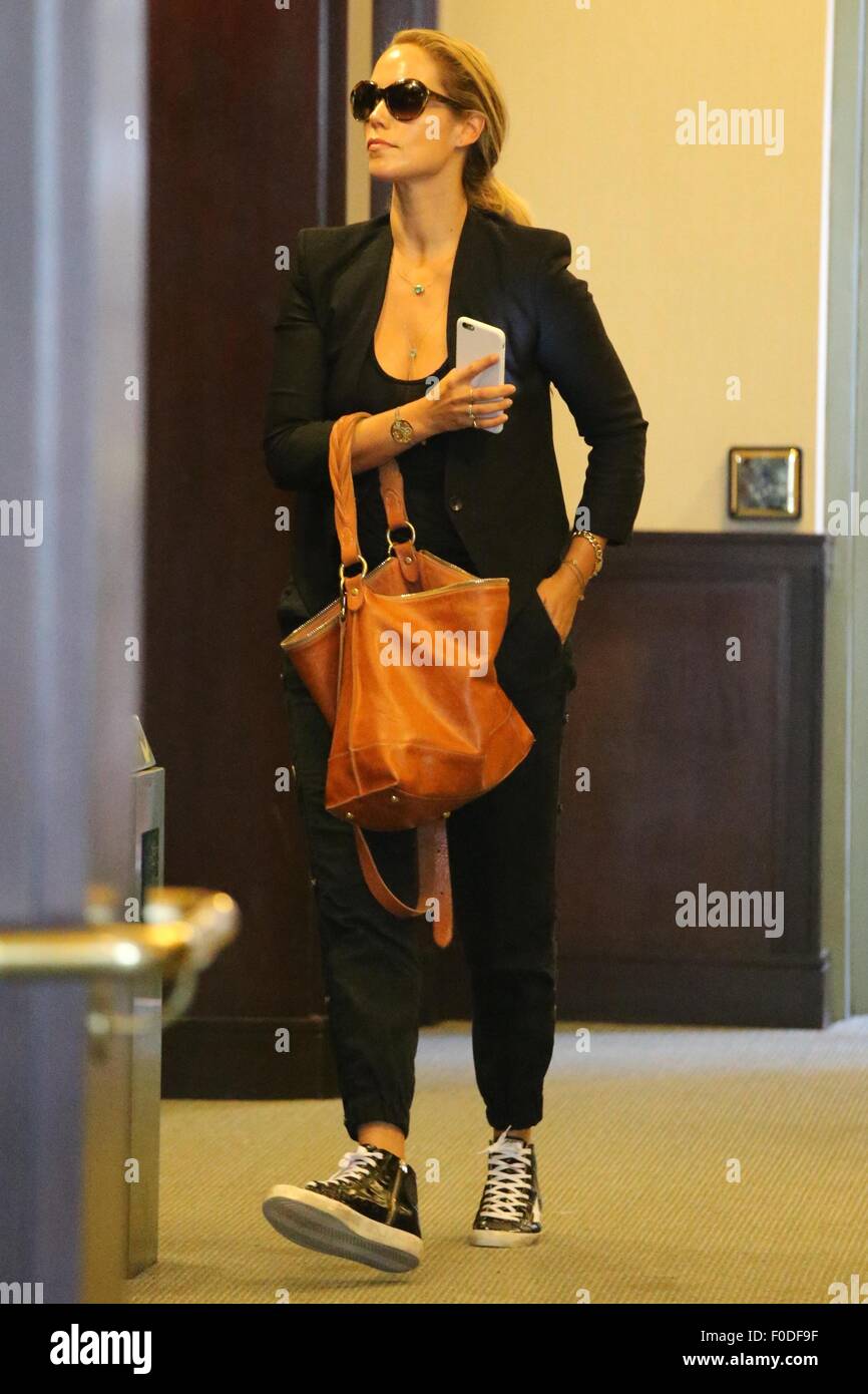 Elizabeth Berkley enters a medical building Featuring Elizabeth