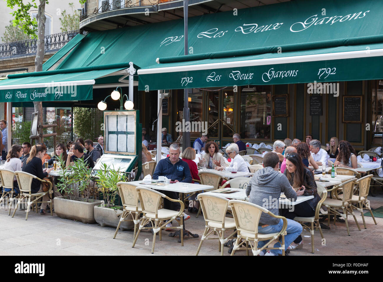 Les Deux Garcons on the Cours Mirabeau in Aix-en-Provence, France. A famous cafe visited often by the painter Cezanne. Stock Photo